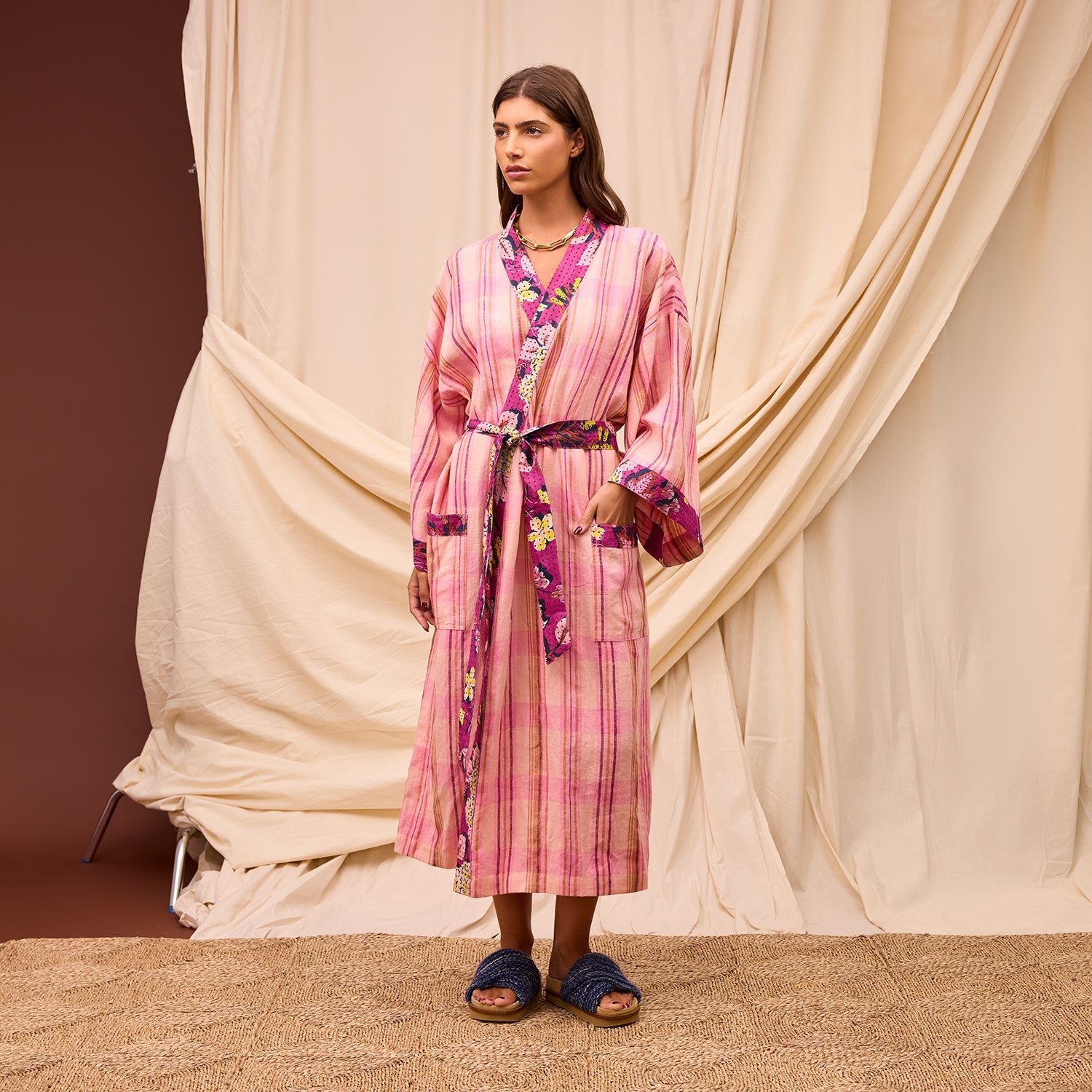 Full length front view of Nicolette Linen Robe Poudre with floral belt and wide sleeves by Sage Clare