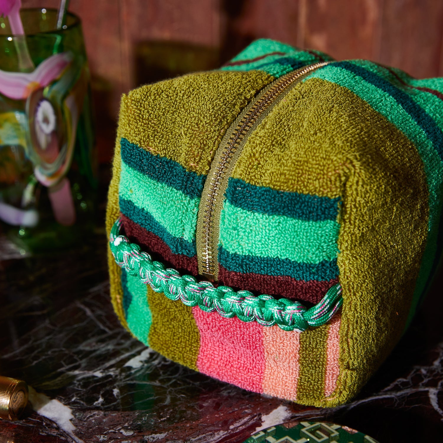 Close-up of zip closure detail on Nicolette Terry Pouch with complementary paracord pull tabs