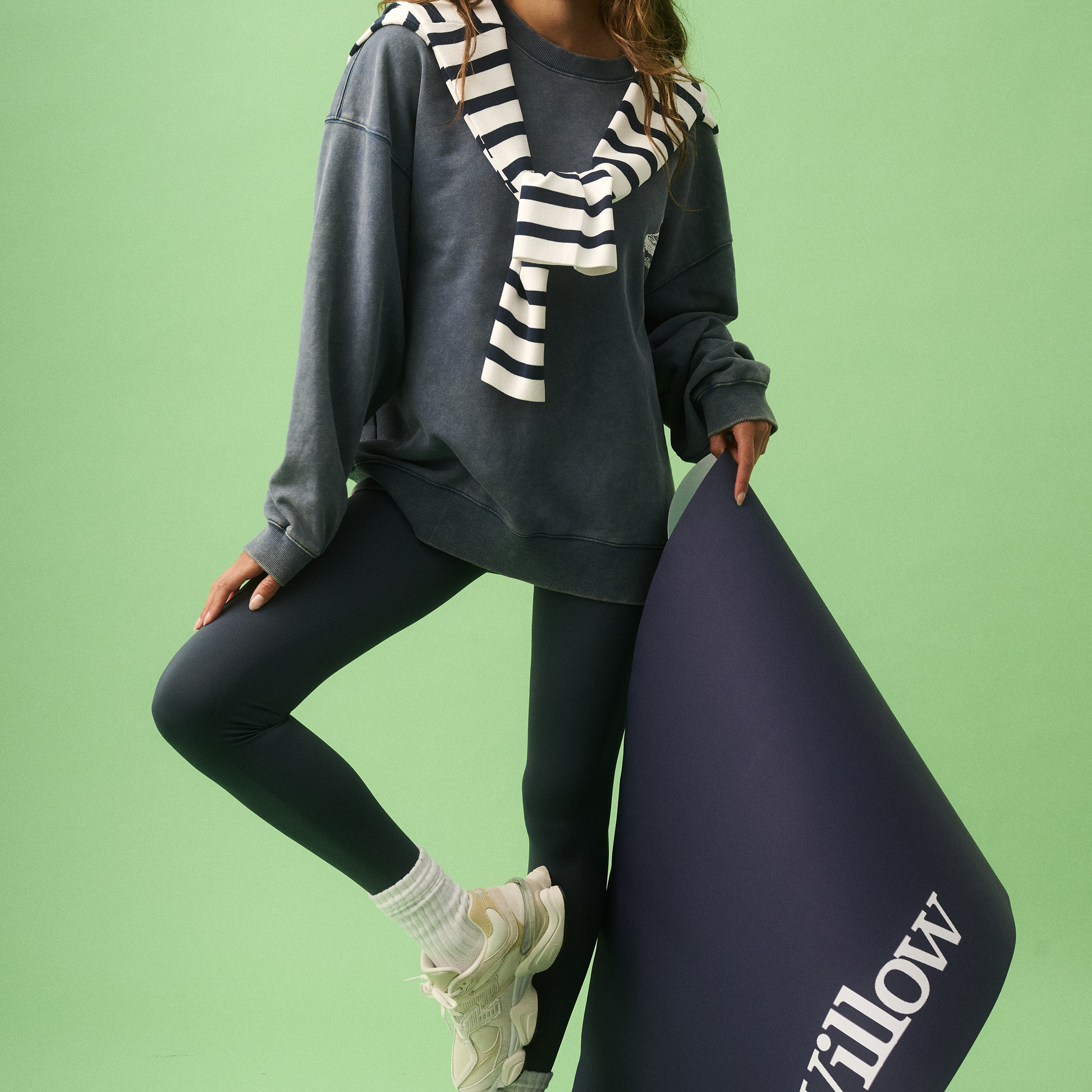 Front view of Nina Sweater in blue with striped scarf styled over oversized relaxed fit sweatshirt