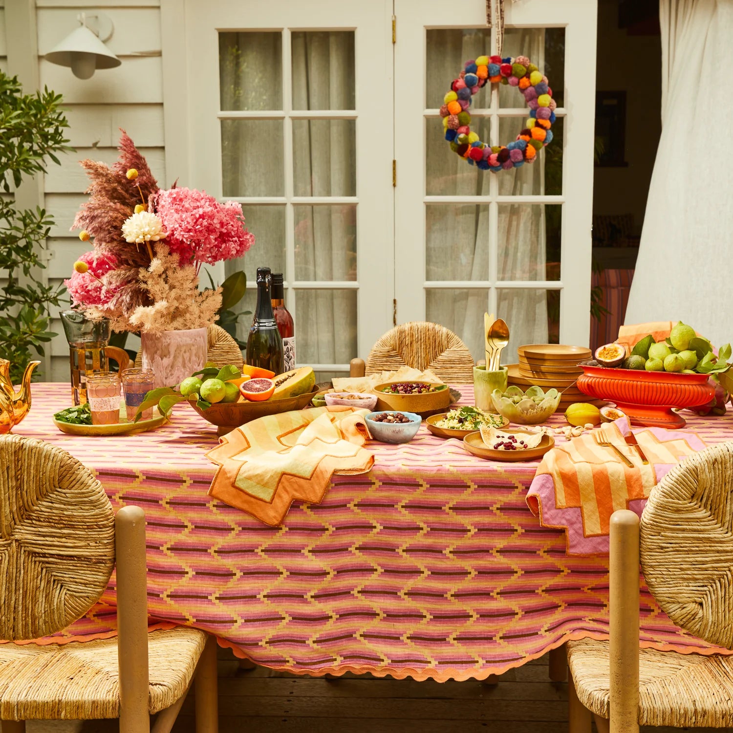 Nisha Tablecloth Posy by Sage & Clare with outdoor table display setting