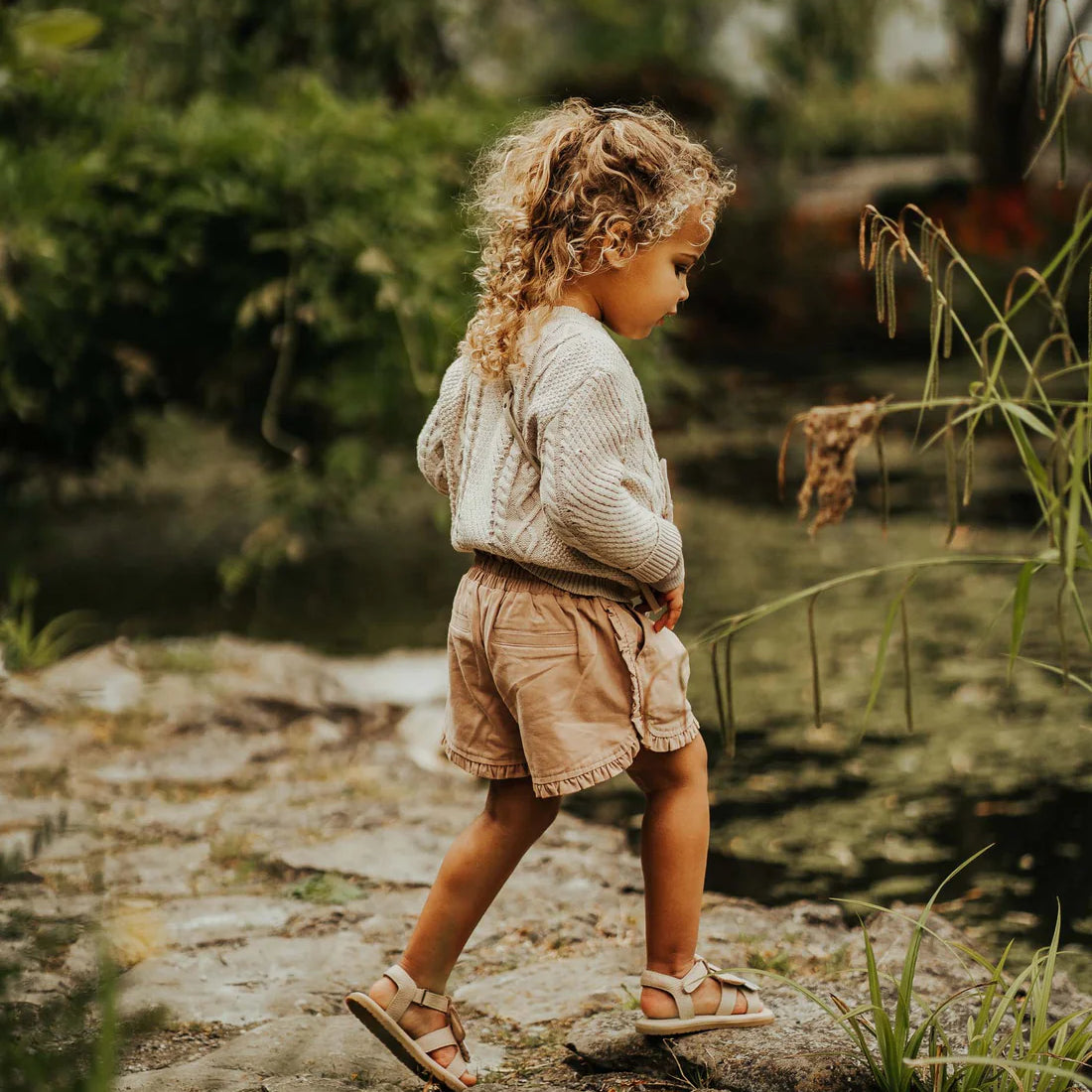 Girl wearing Niven Shorts in Rose Mocha by Donsje with Donsje Jumper and shoes