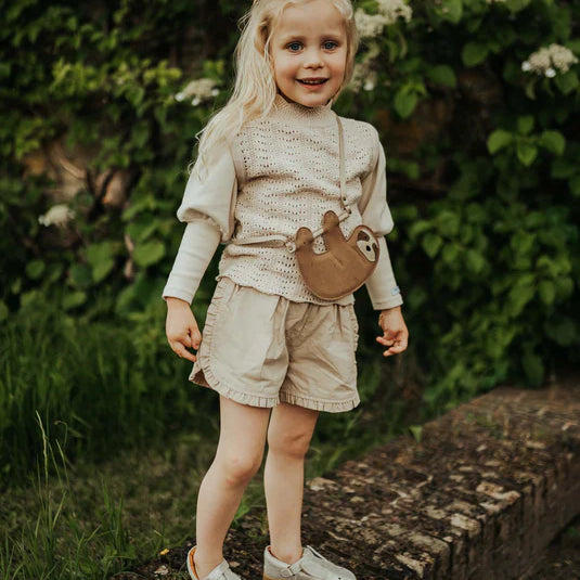 Girl wearing Niven Shorts in Soft Taupe colour by Donsje Amsterdan