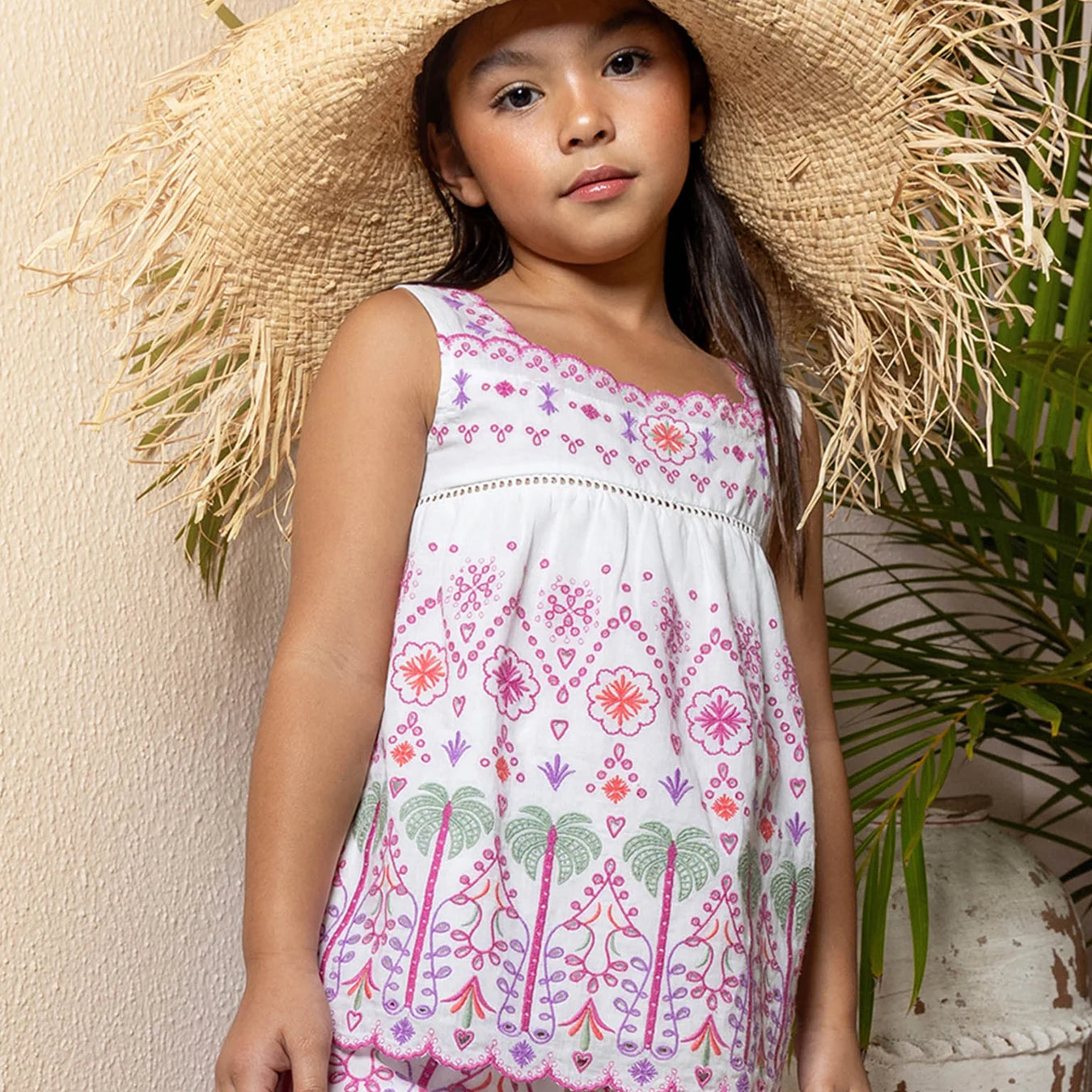 girl wearing white & pink Oasis Shorts by Tutu Du Monde