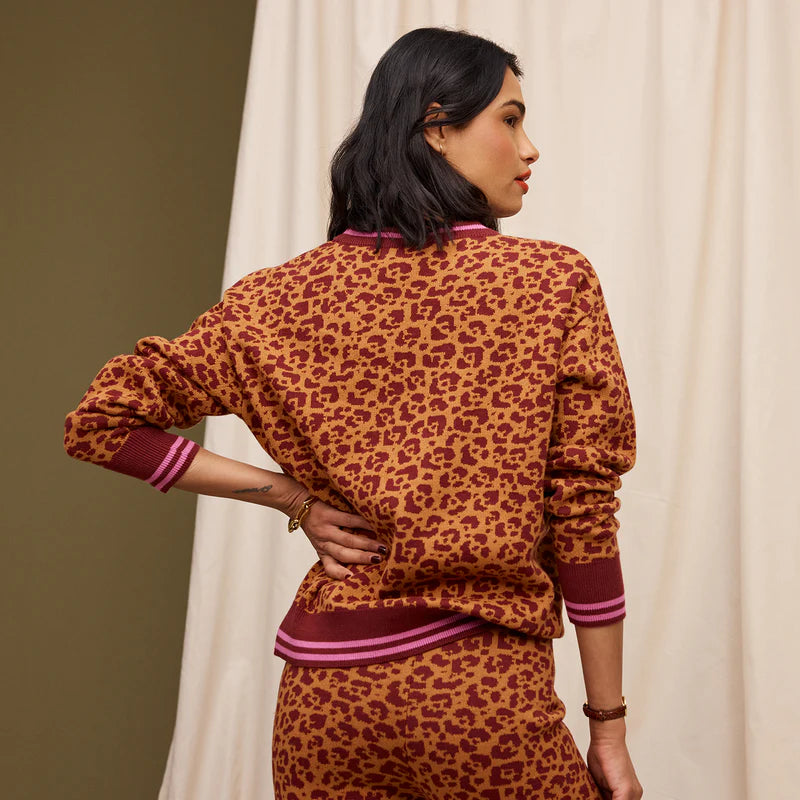 Odette knit sweater by Sage and Clare leopard print with pink cuffs and hem line