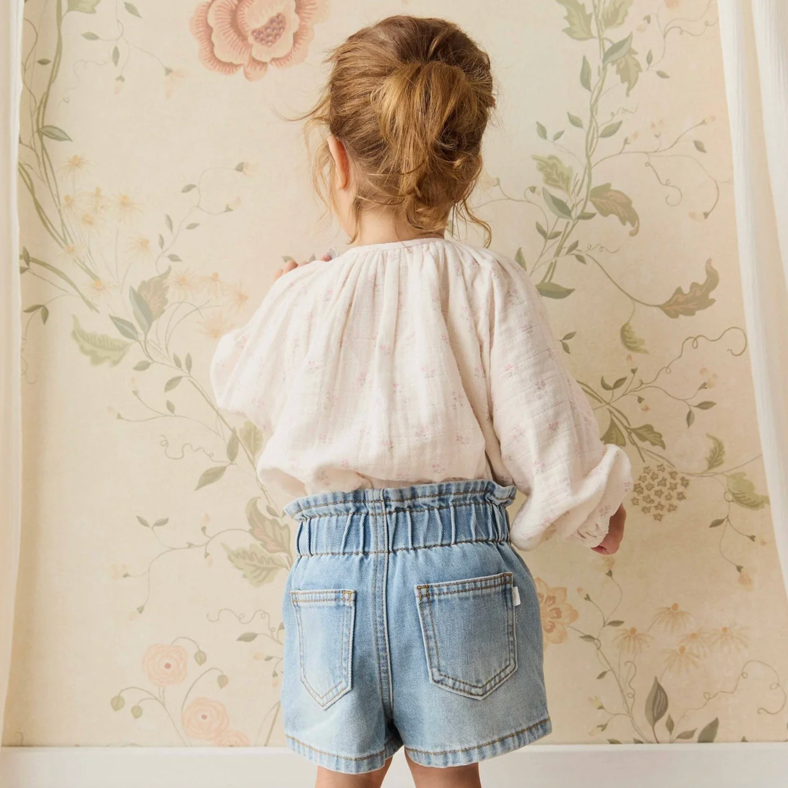 Back view of young girl wearing the Organic Cotton Muslin Heather Blouse - Pauline Pink | Jamie Kay