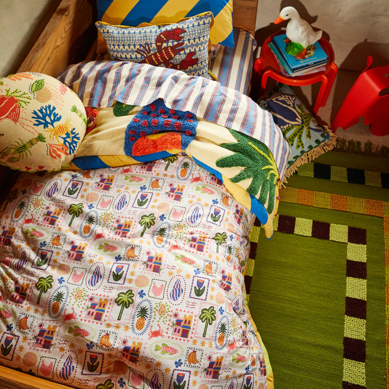 Ottilie Tufted Bedcover by Sage & Clare display on childs bed