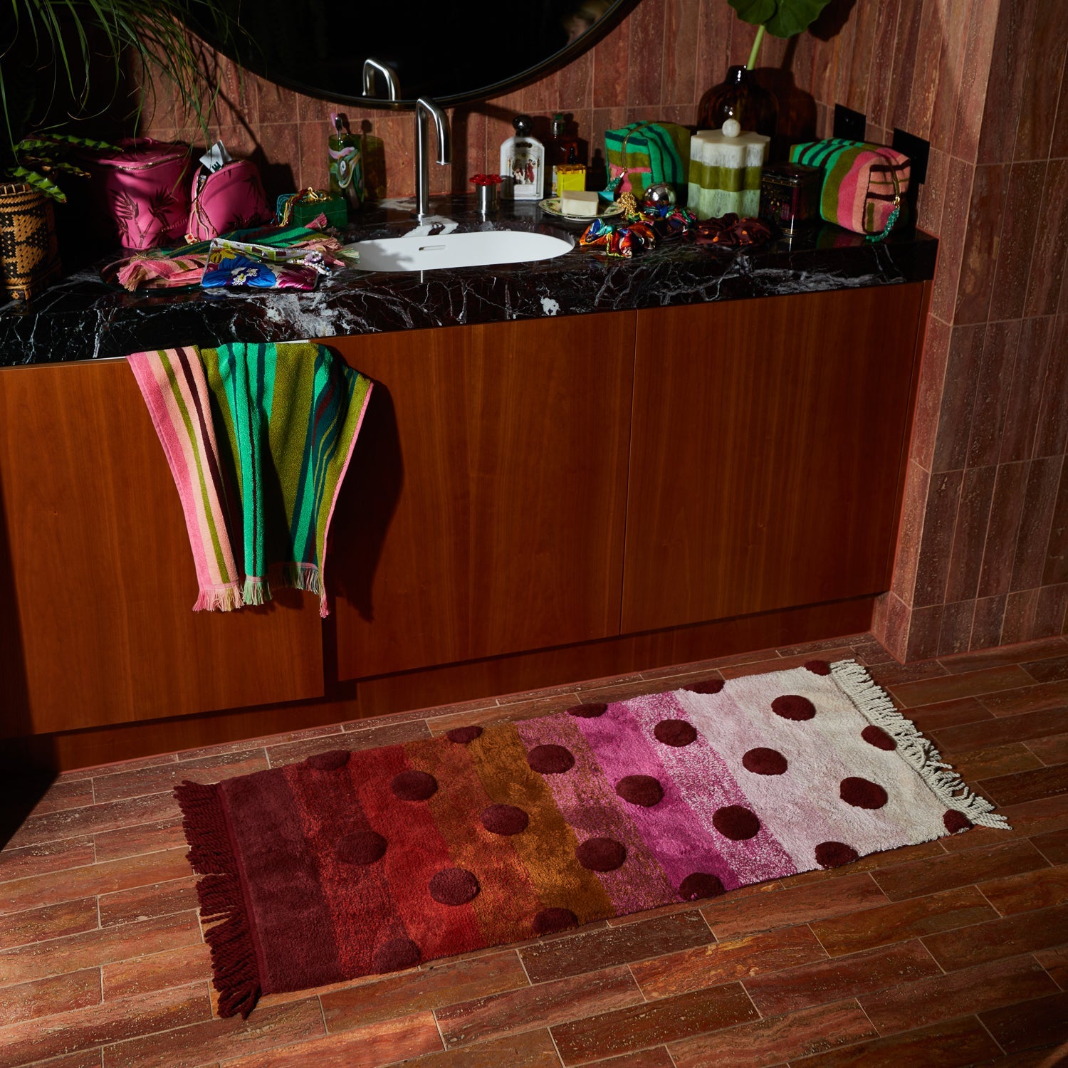 Paige Bath Runner positioned at bathroom vanity demonstrating luxury bath mat for morning routine