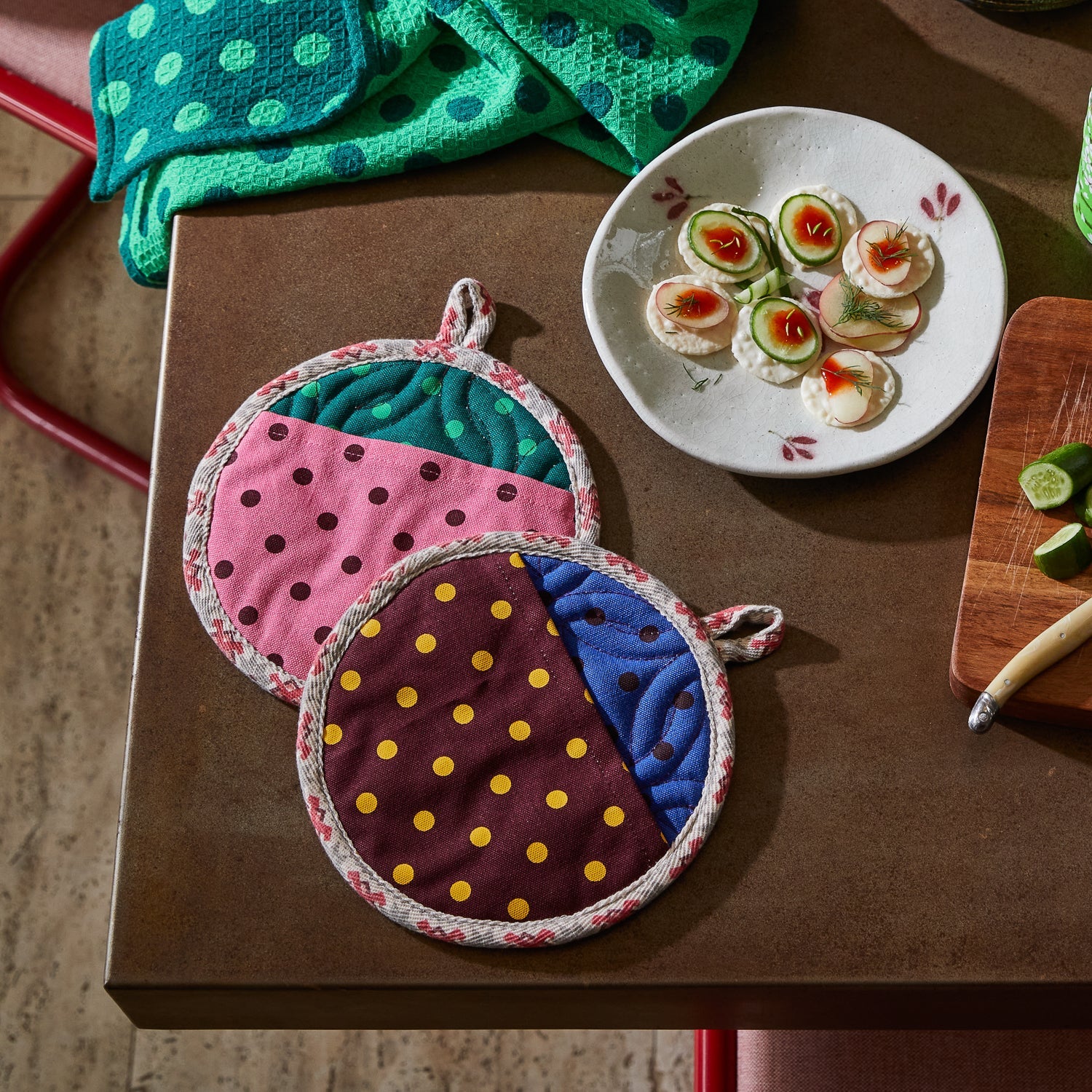 Paige Pot Holder Set by Sage & Clare featuring colorful polka dot patterns with woven rope trim