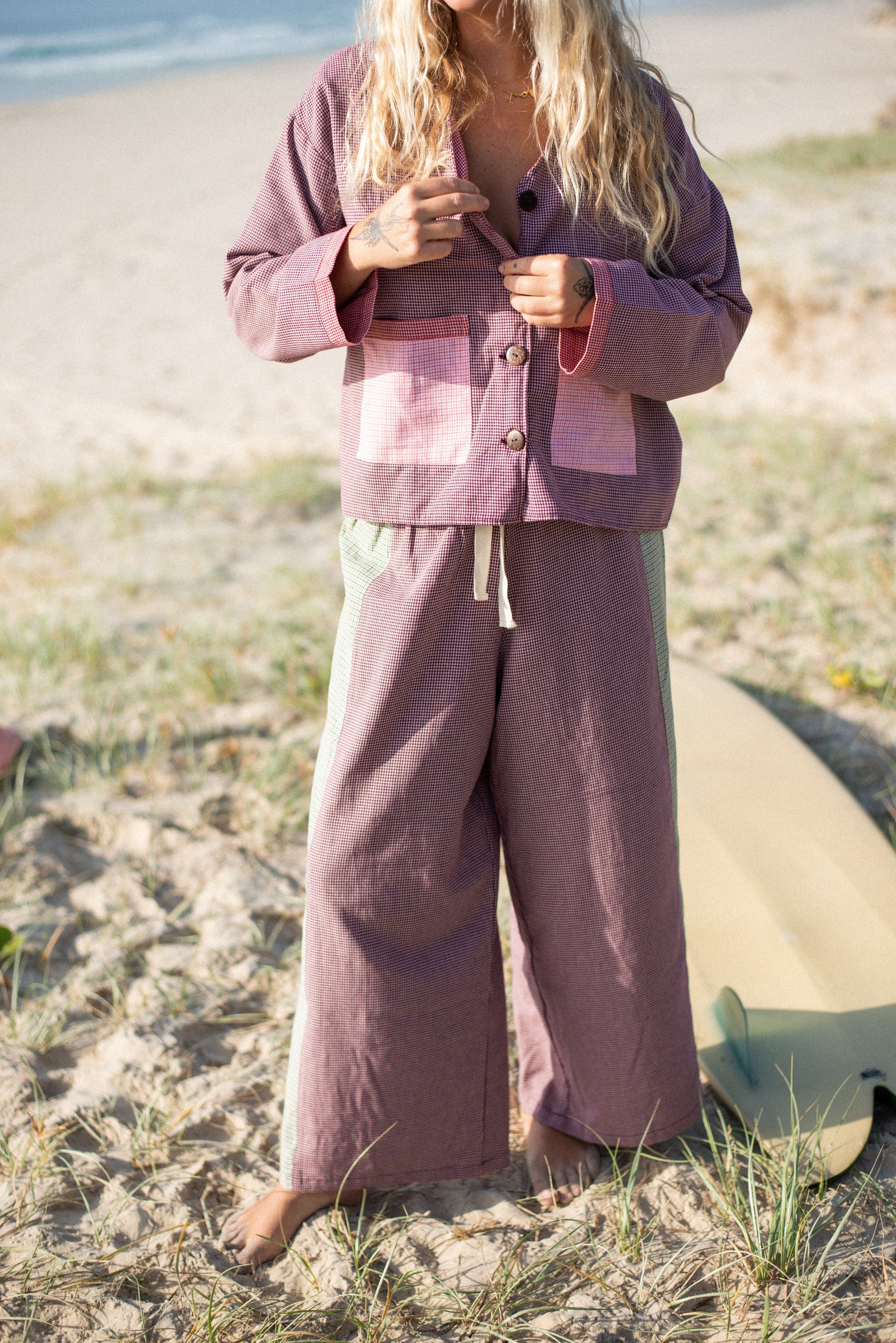 Beach lifestyle photo of houndstooth patchwork over shirt with button-up front and relaxed fit