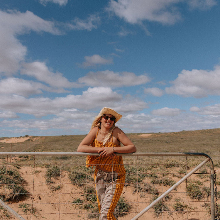 model wearing Patchwork Singlet by Atmosea – Ginger Gingham