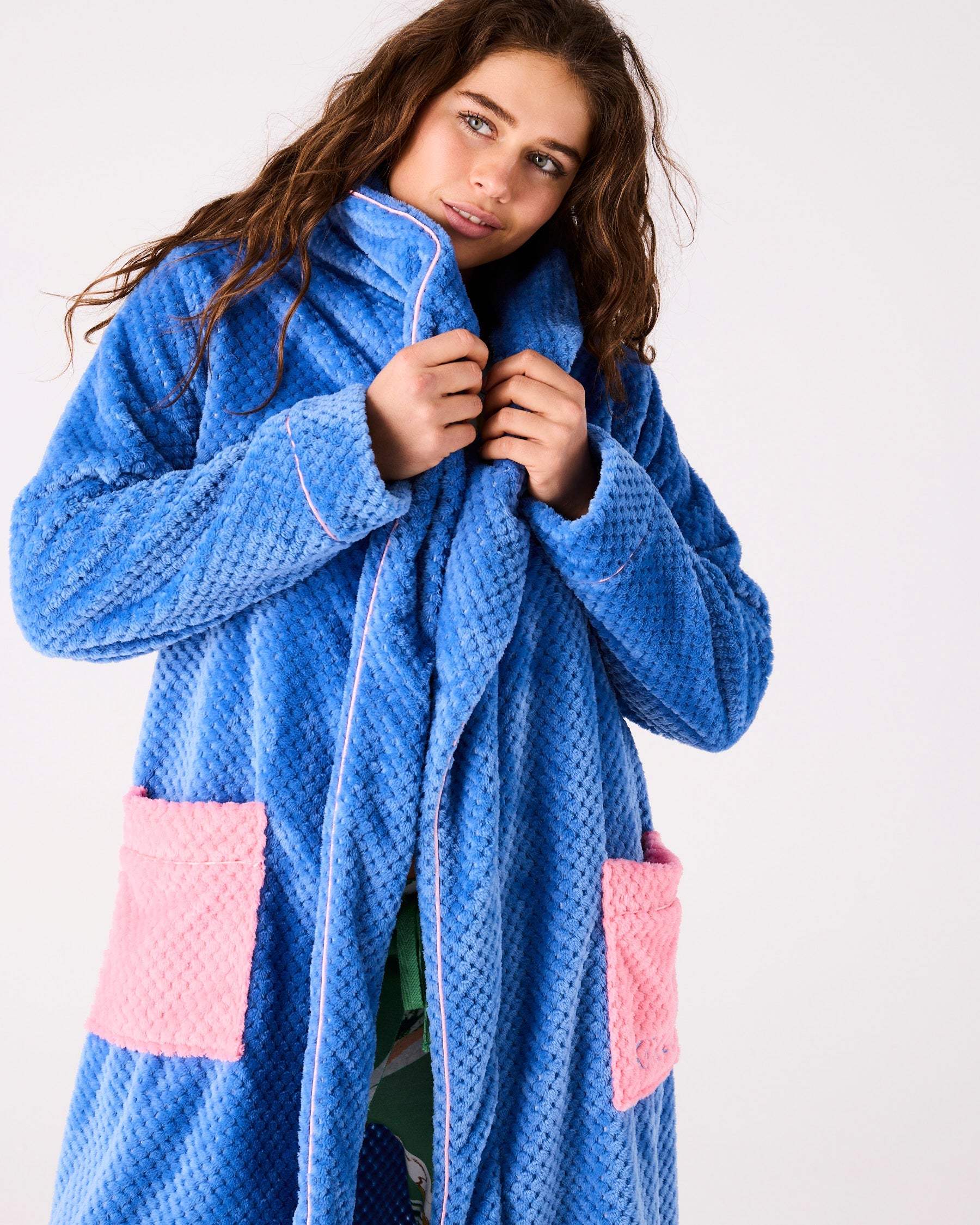 Close-up front view of blue waffle textured Pie In The Sky robe showing collar and pink pocket detail