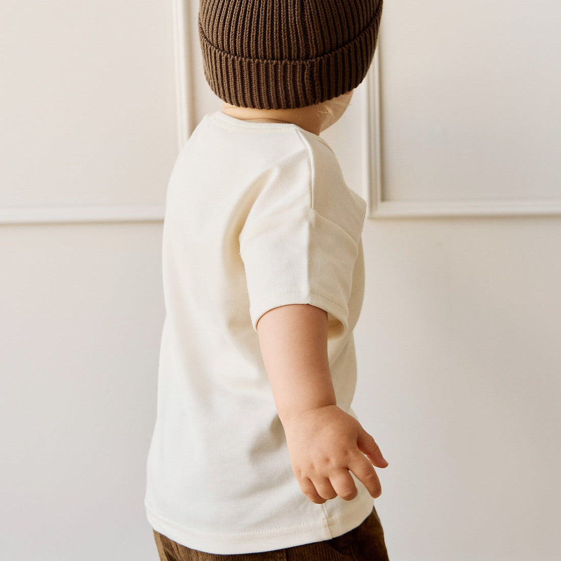 Back view of boy in Pima Cotton Eddie Tee - Cloud | Jamie Kay