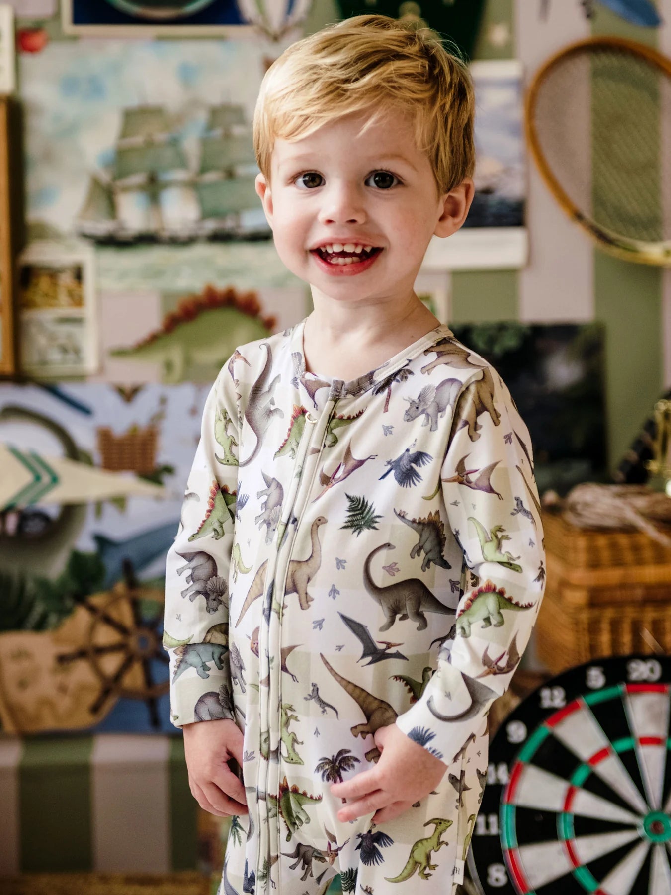 Boy wearing 'Prehistorica' Timeless Coverall - Avocado by Fleur Harris