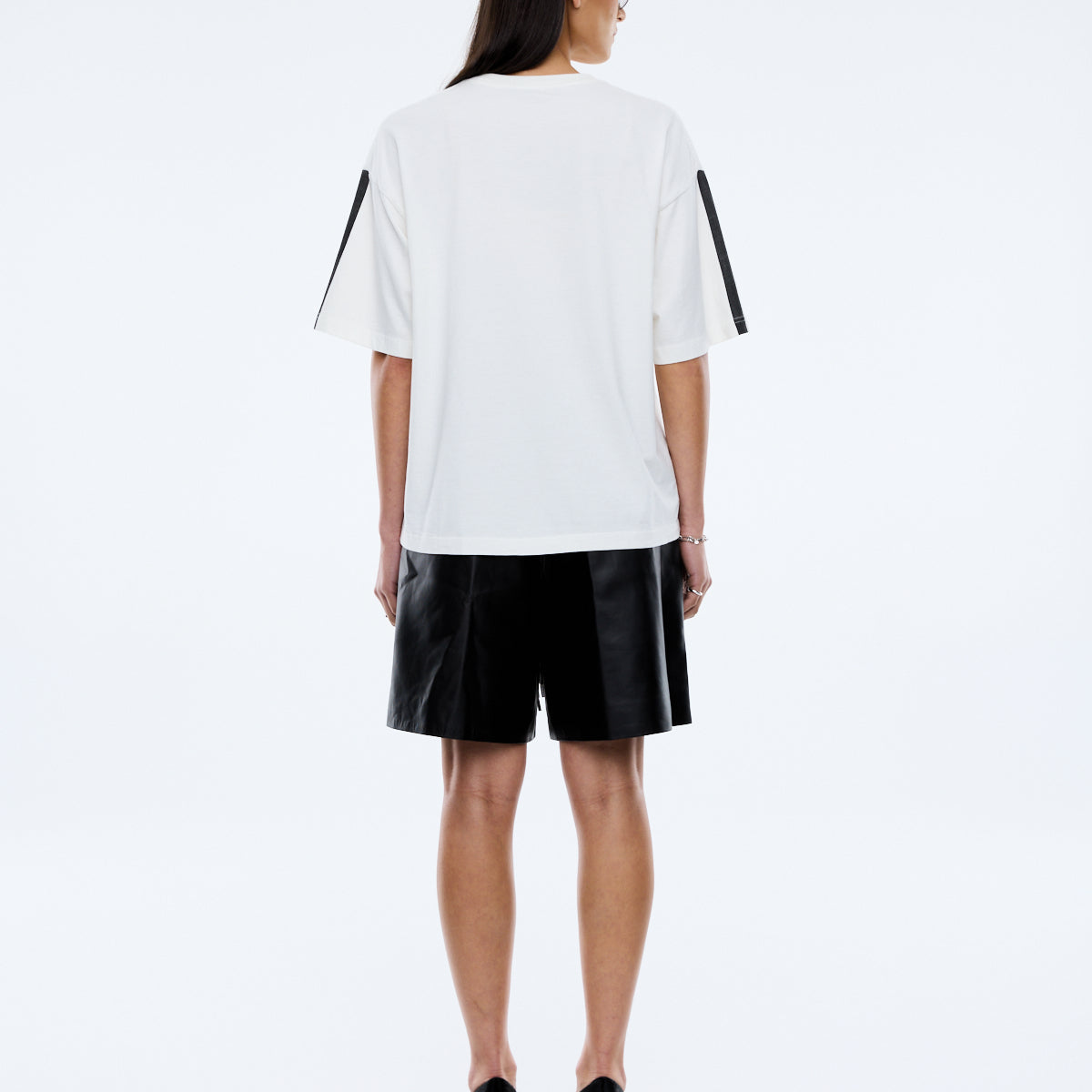 Racing Pelly Swoop tee fabric detail showing soft cotton material and vintage white wash finish quality