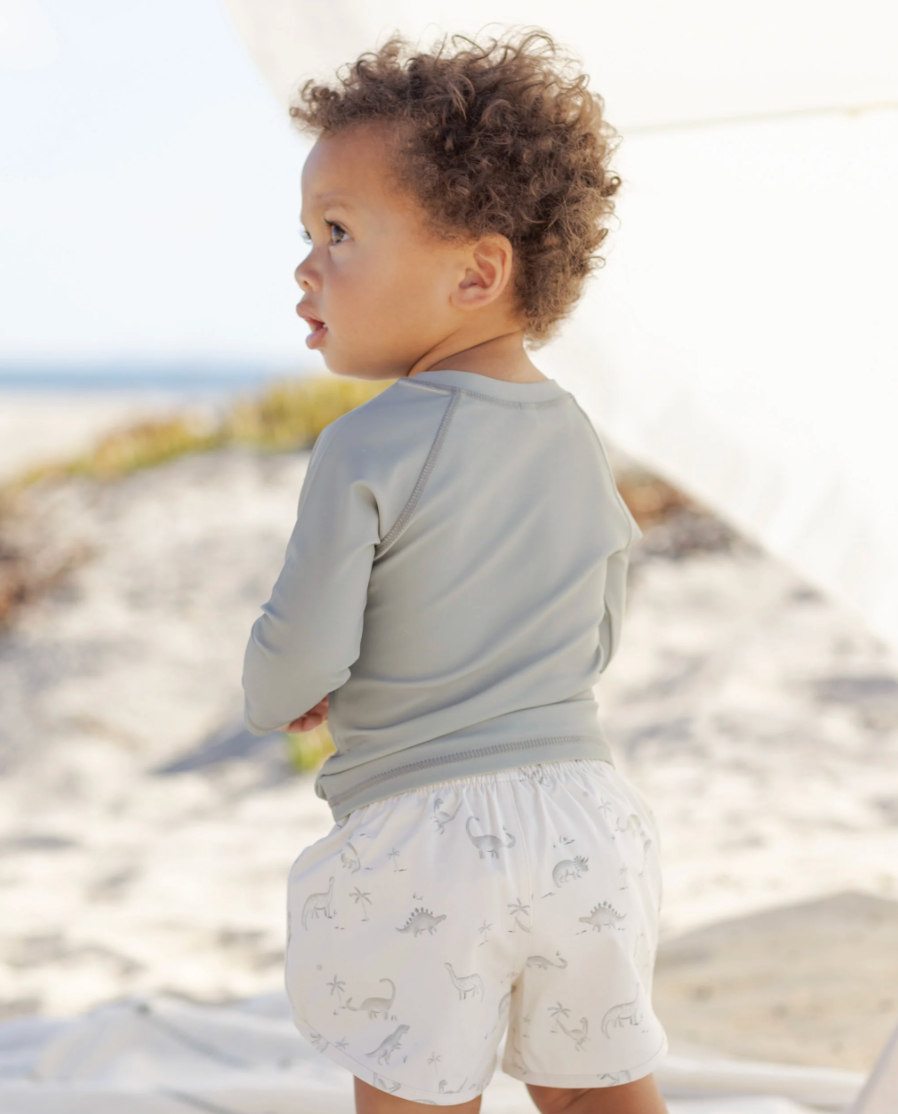 Back view of toddler wearing the Rashguard Sage | Quincy Mae