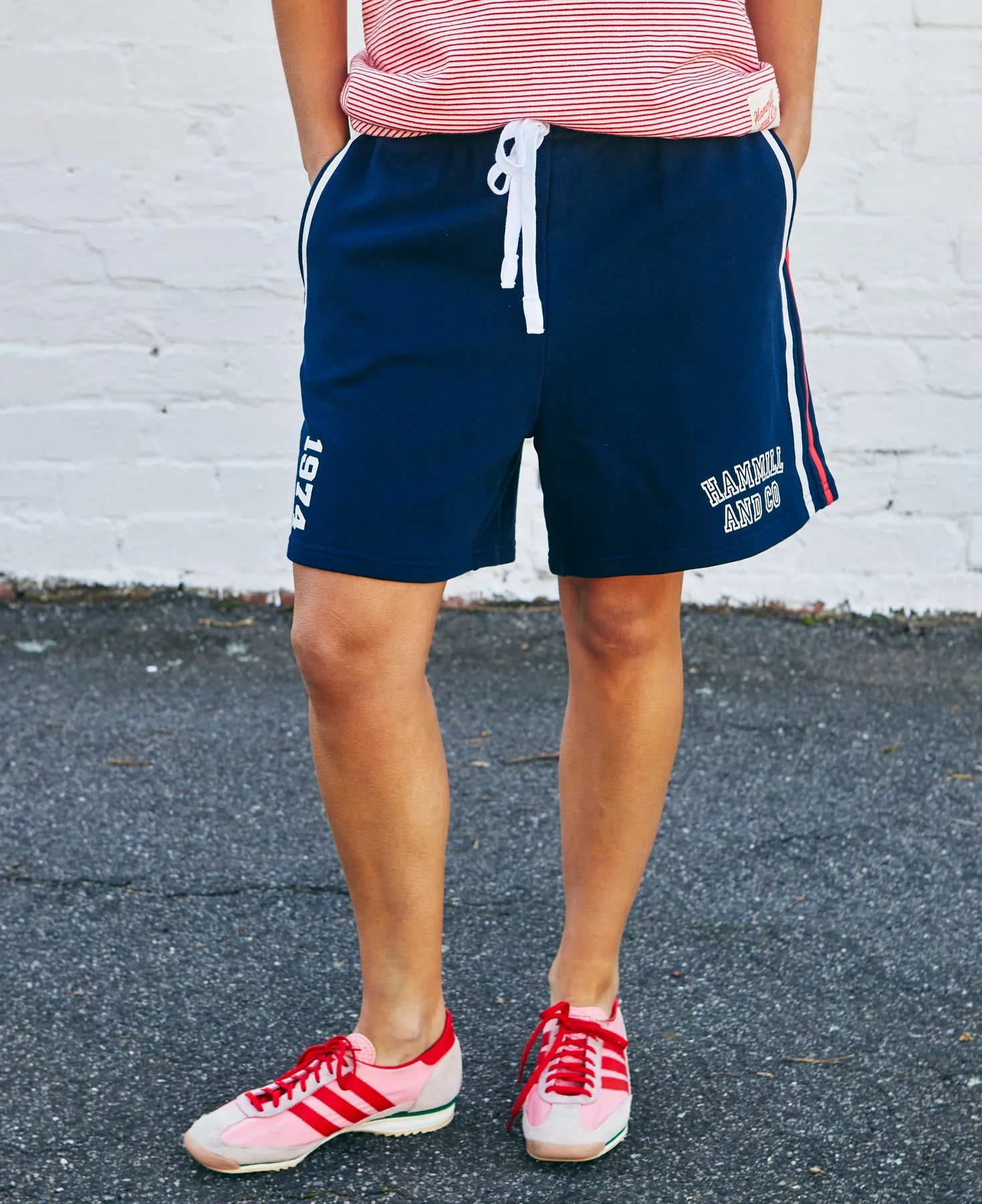 model wearing navy fleece shorts by Hammill & Co