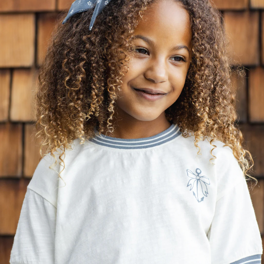 Young girl in the Ringer Tee Anchor Bow | Rylee + Cru