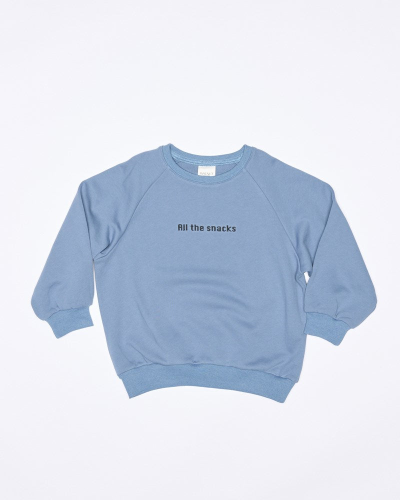 Front view of the River Sweatshirt All The Snacks - Blue | Walnut