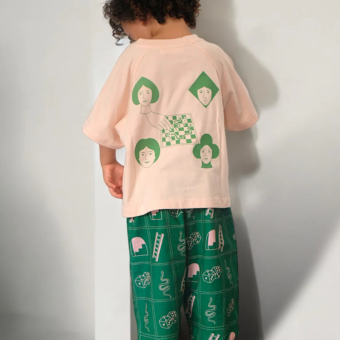 boy wearing the Roll the Dice Tee by Sauce Mini