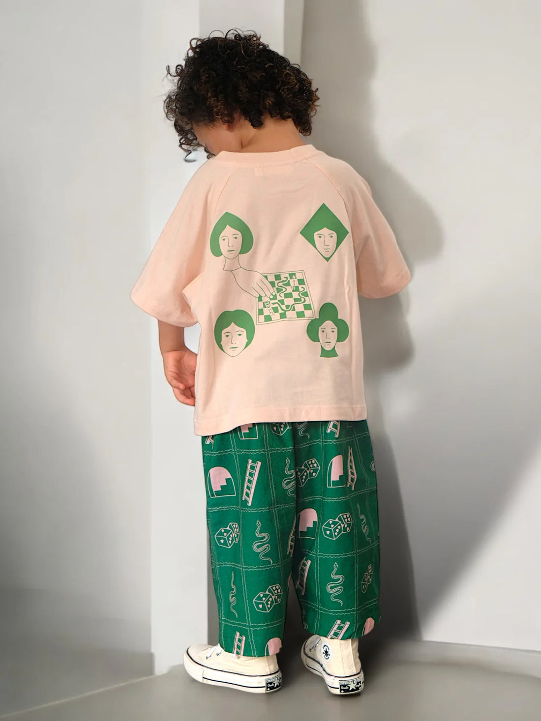 boy wearing the Roll the Dice Tee by Sauce Mini