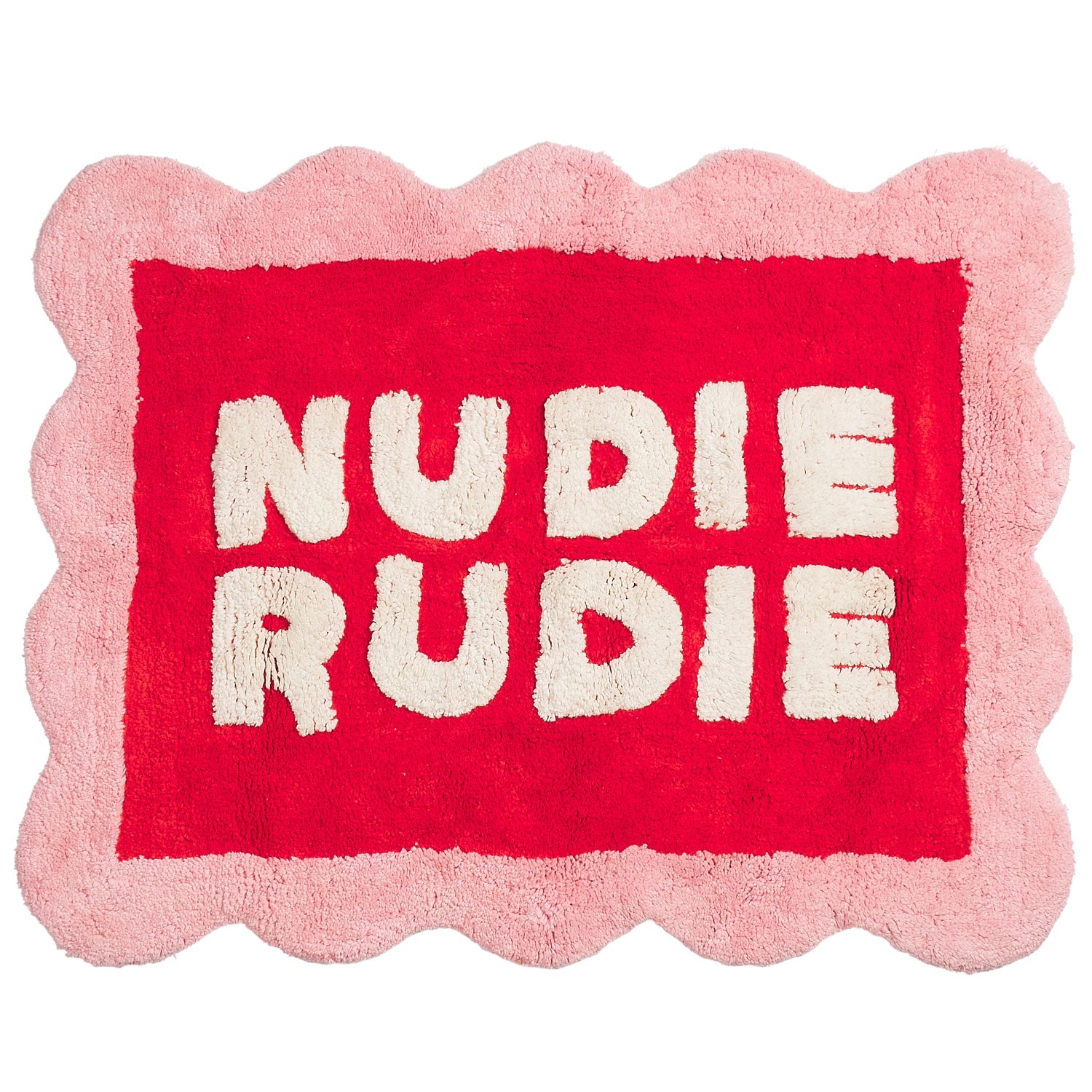 Poppy Nudie Rudie bath mat with scalloped pink border and bold red centre, white tufted lettering, flat-lay view