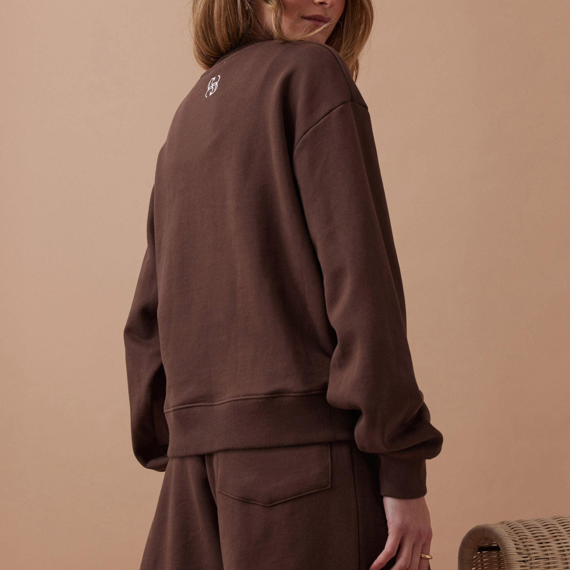 model wearing brown sweater - Ruby Reverse Panel Crew Chocolate Ceres Life
