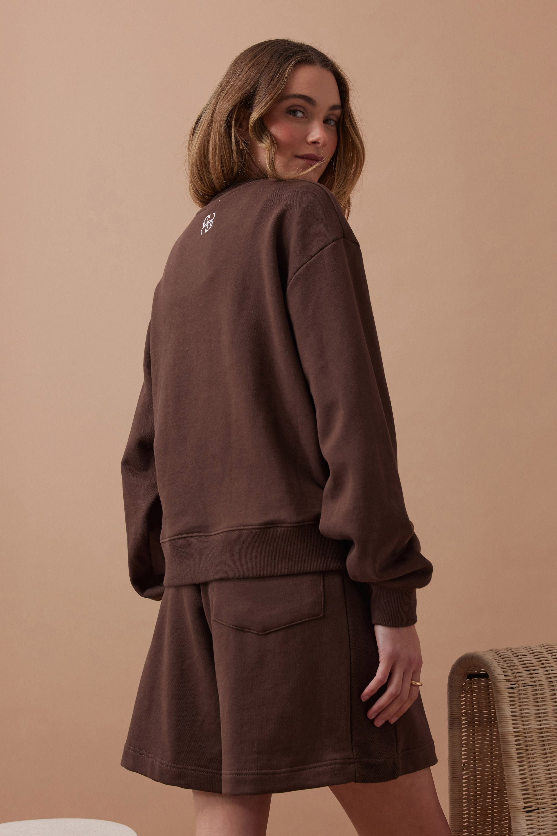model wearing brown sweater - Ruby Reverse Panel Crew Chocolate Ceres Life
