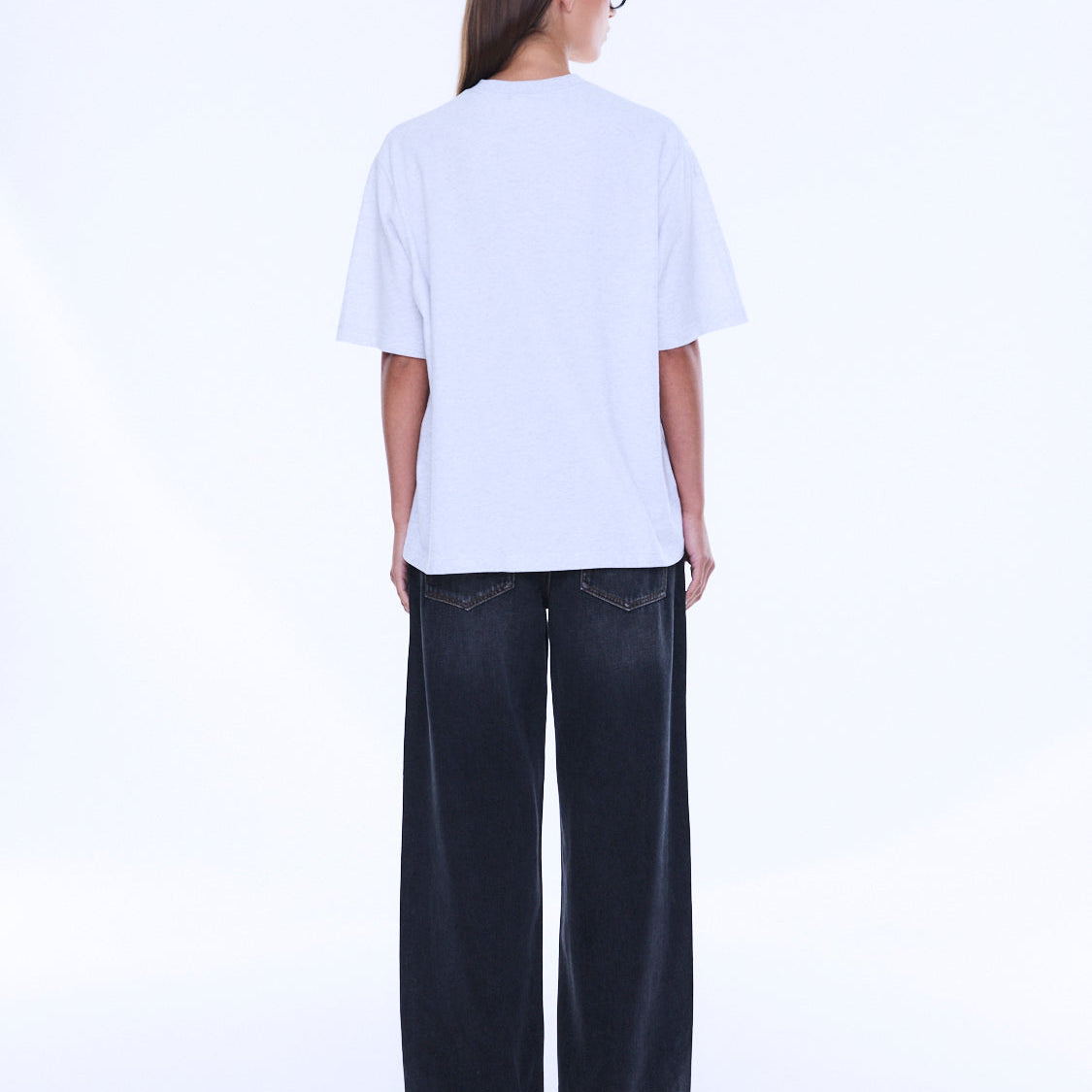 Back view of Sophia Relaxed Tee showing plain white cotton design and relaxed silhouette from behind