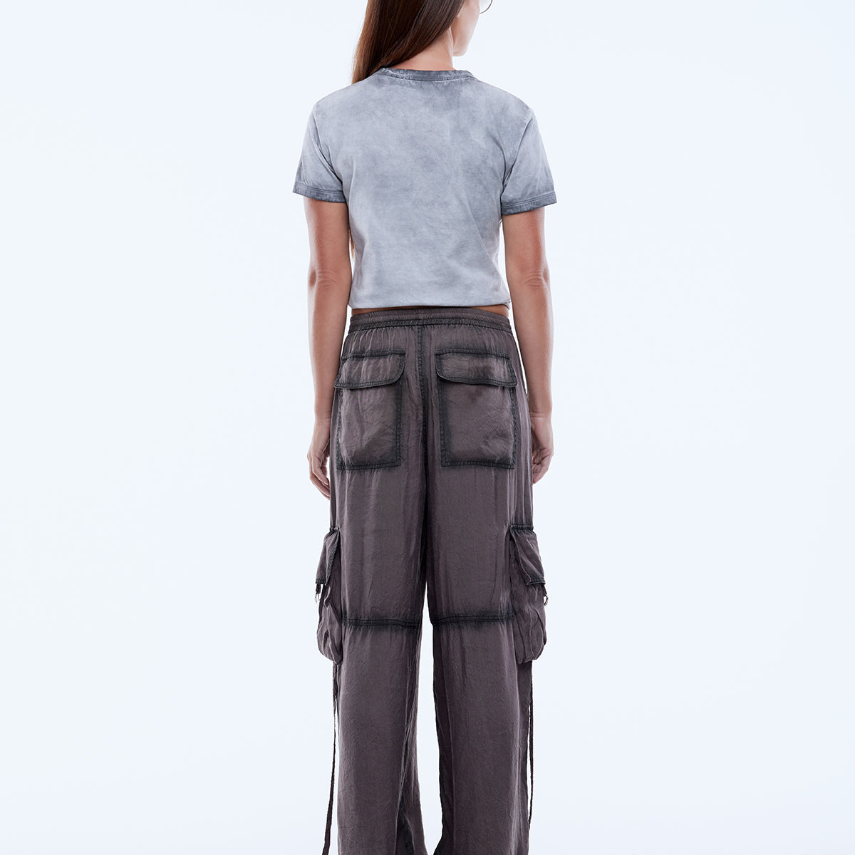 back view showcasing relaxed fit and inseam pockets of Stardust cargo pants