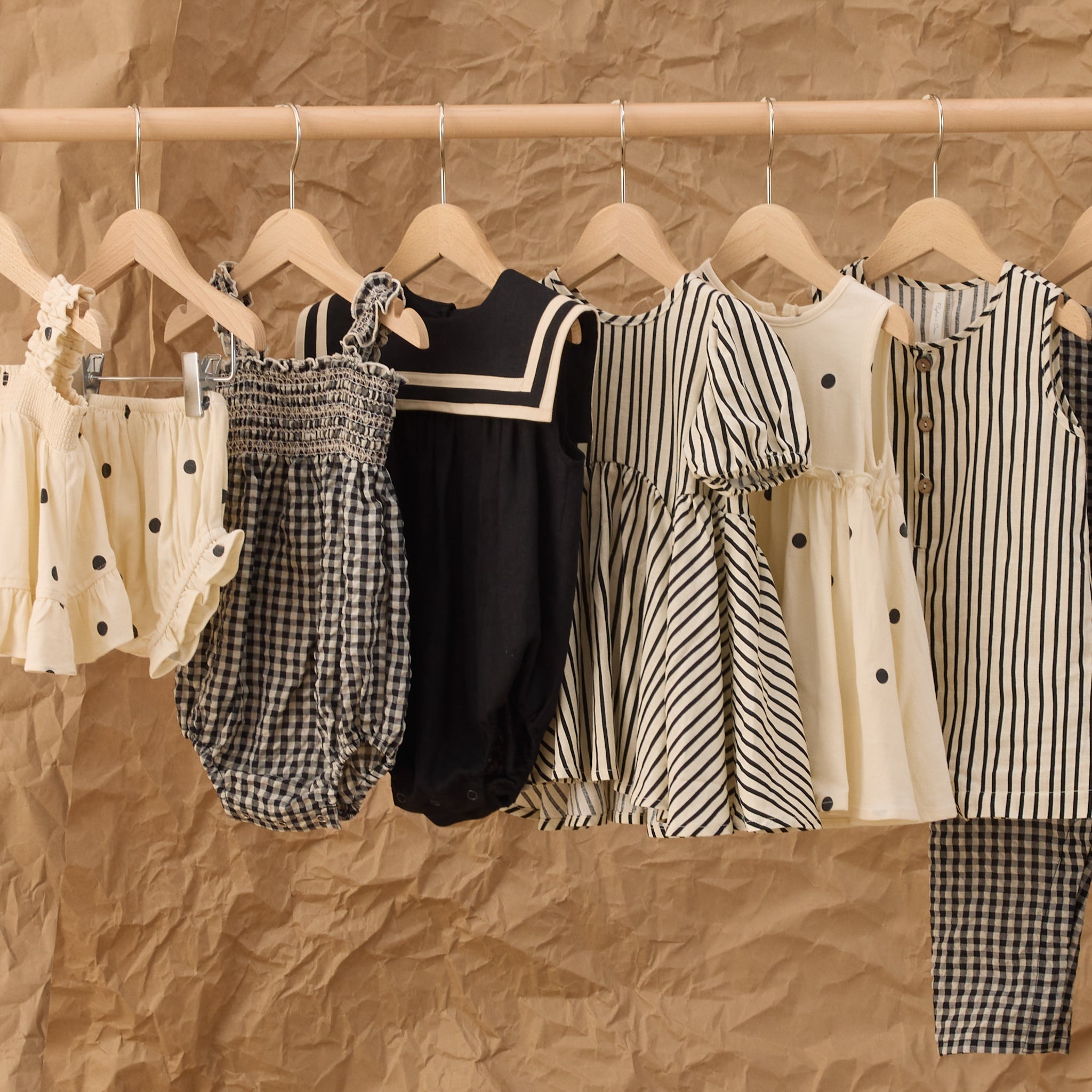 Sailor Romper Black | Rylee + Cru on hanger