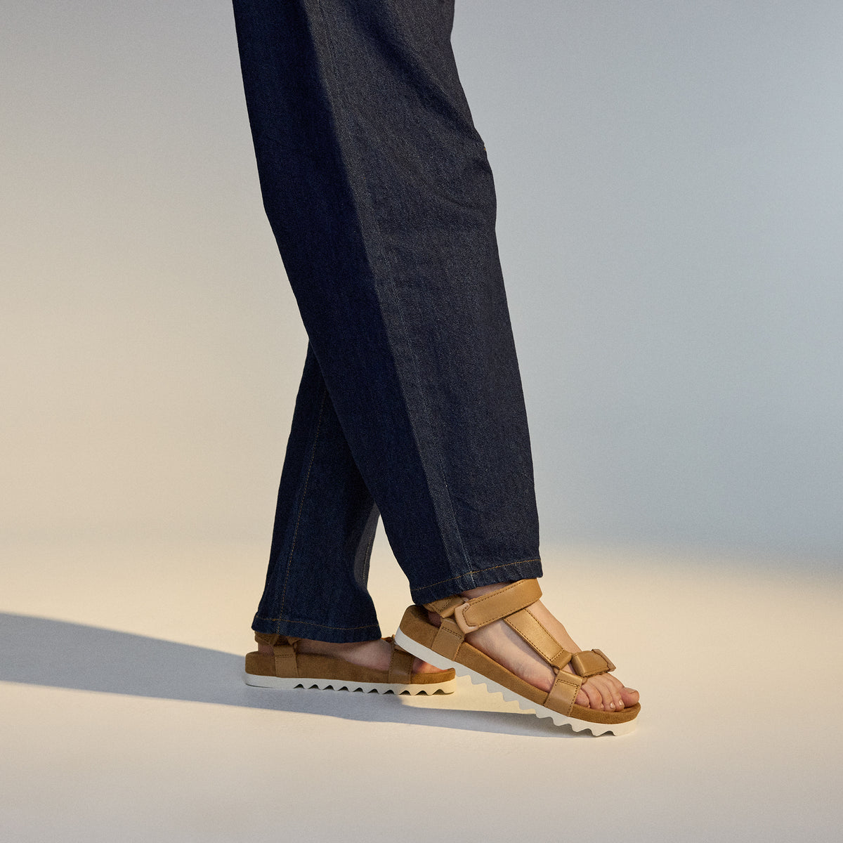 model wearing Sandal Tooth Wedge Soft Tan by Rollie
