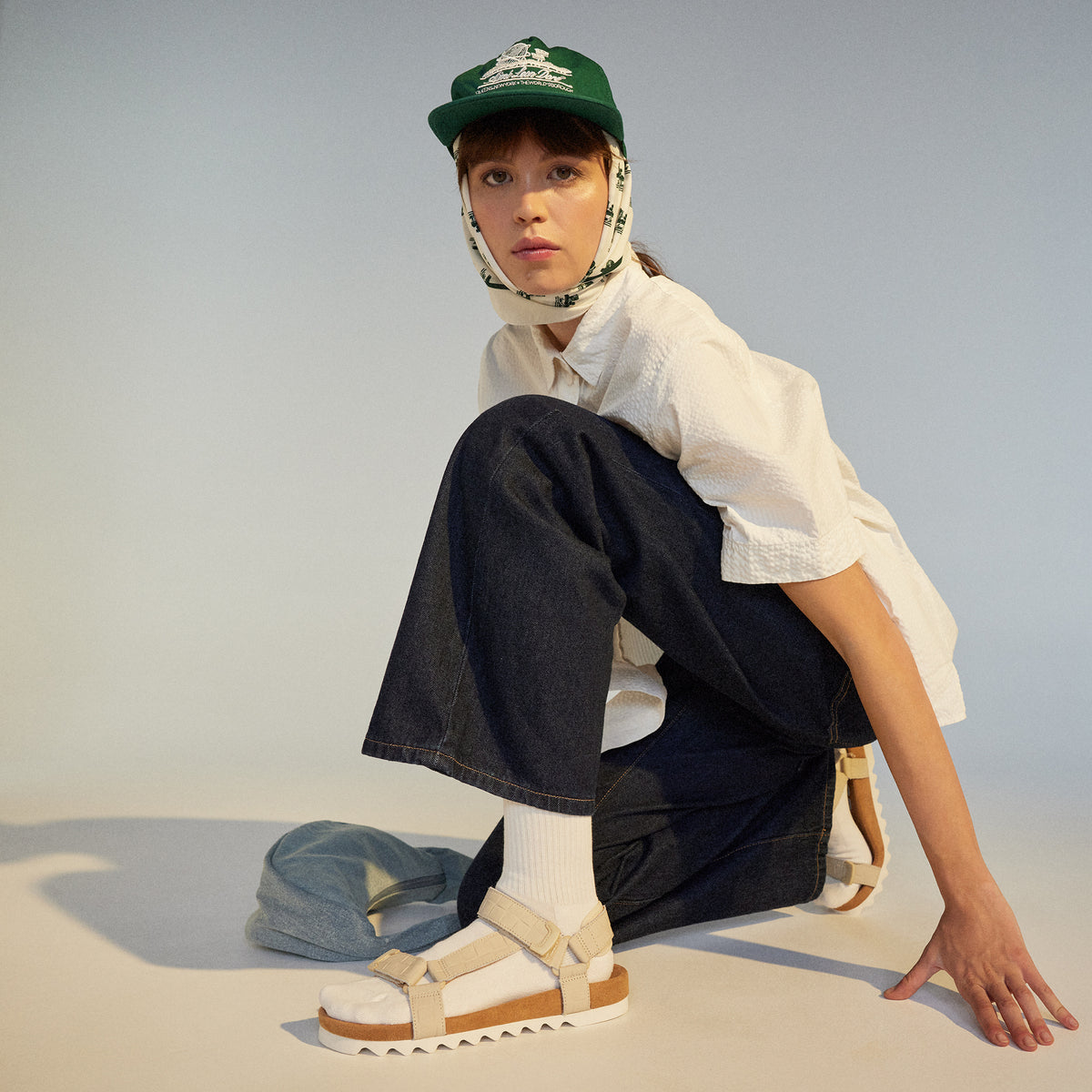 model wearing Sandal Tooth Wedge Bone Croc by Rollie