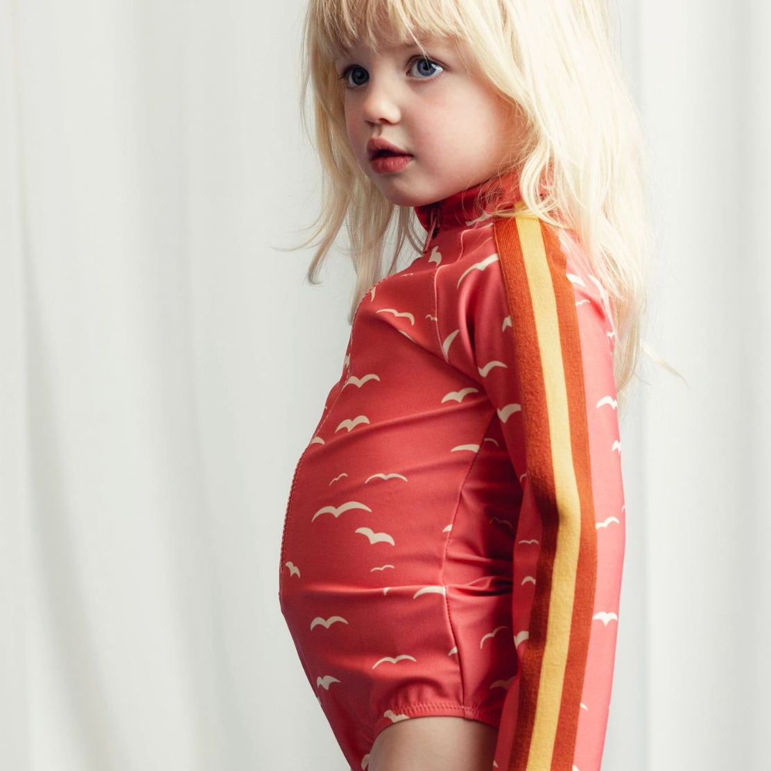 Side view of Seagull Long sleeve Swimsuit - Pink | Mini Rodini