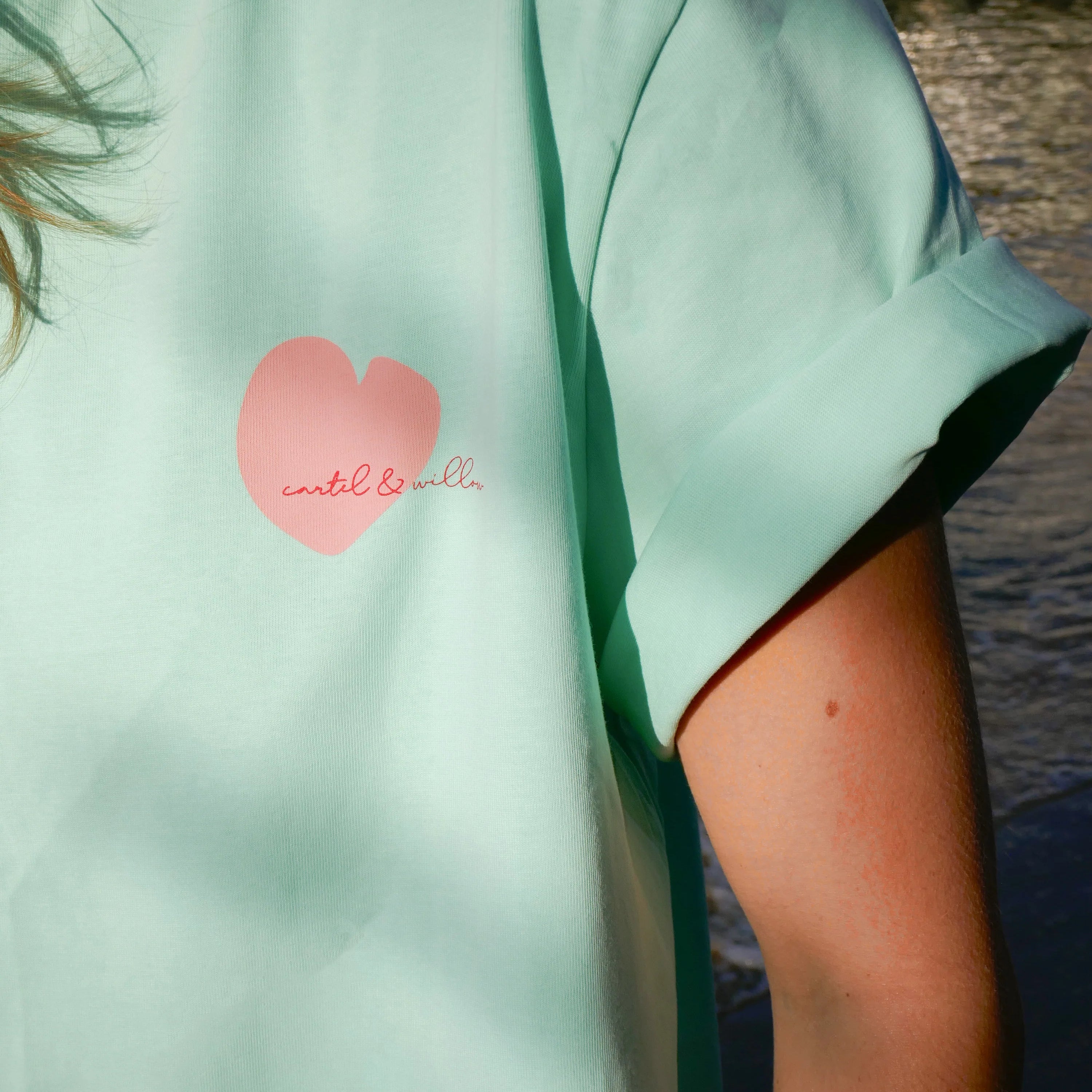 Sleeve details of Self Love Club Tshirt by Cartel and Willow Mint / Pink