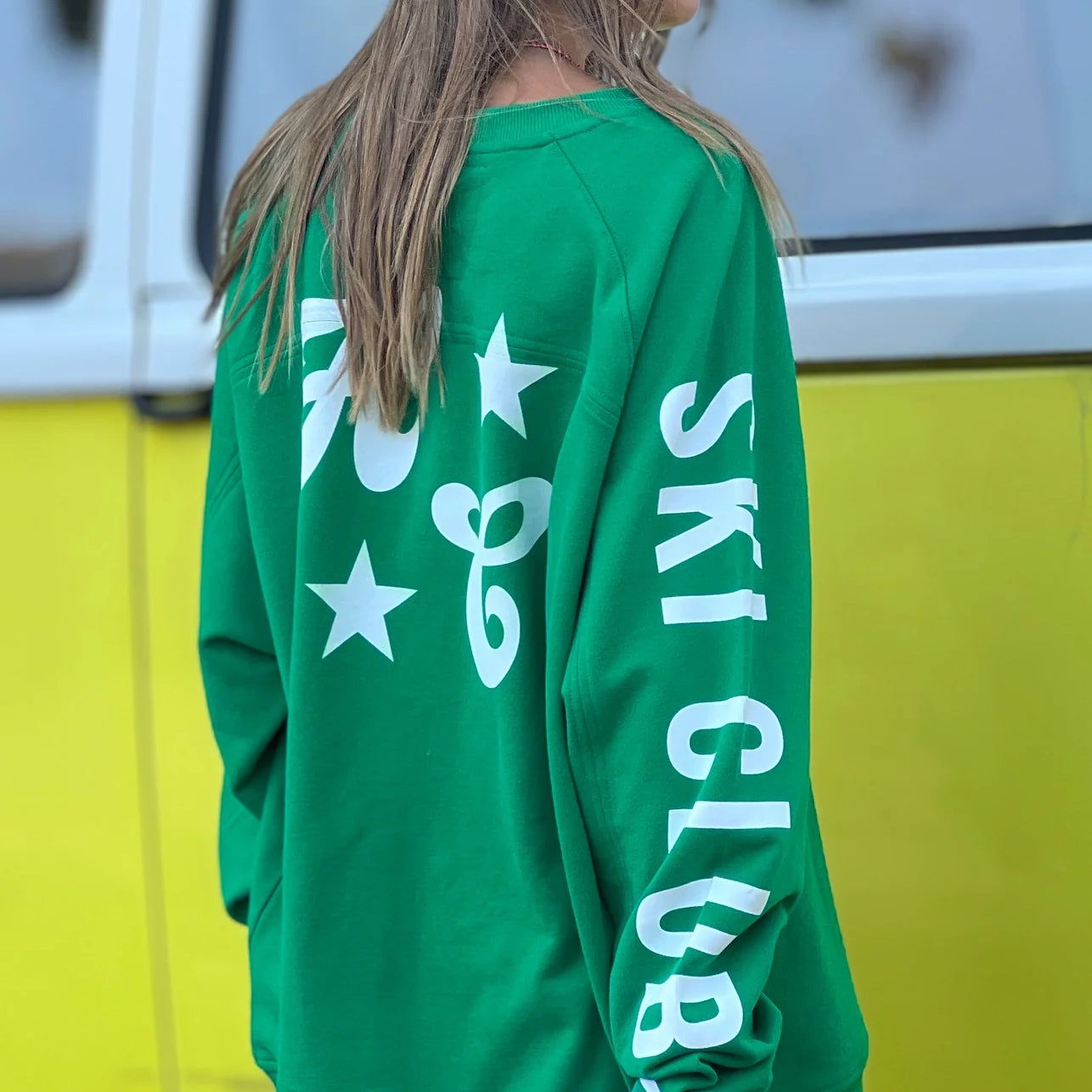 Model back wearing SKI OVERSIZED STRIPE CUFF SWEAT - GREEN