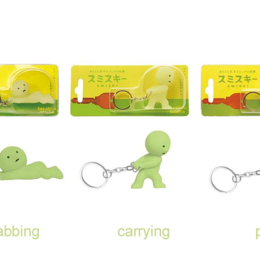 3 different smiski keychains - grabbing, carrying and pulling
