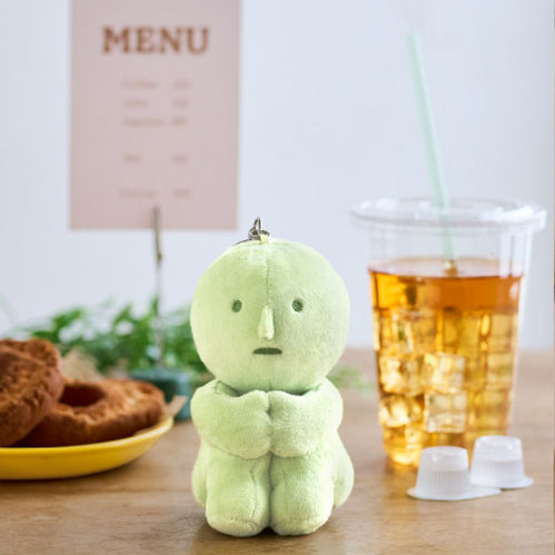 Smiski plush key chain hugging knees