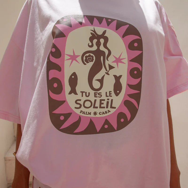 Model wearing oversized Soleil T-shirt Pink by Palm Collective