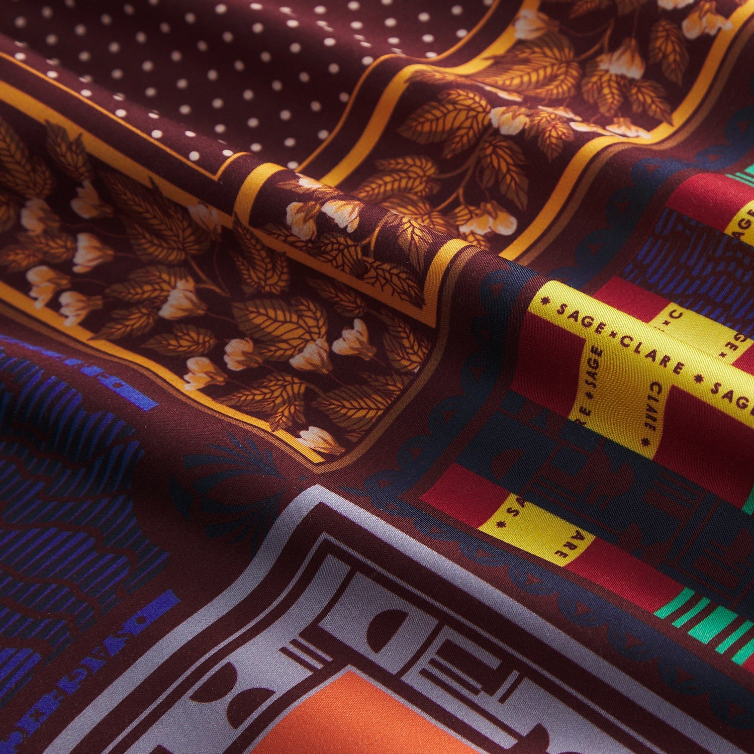 Close-up of multicolor patchwork fabric with floral, polka dot, and geometric print details