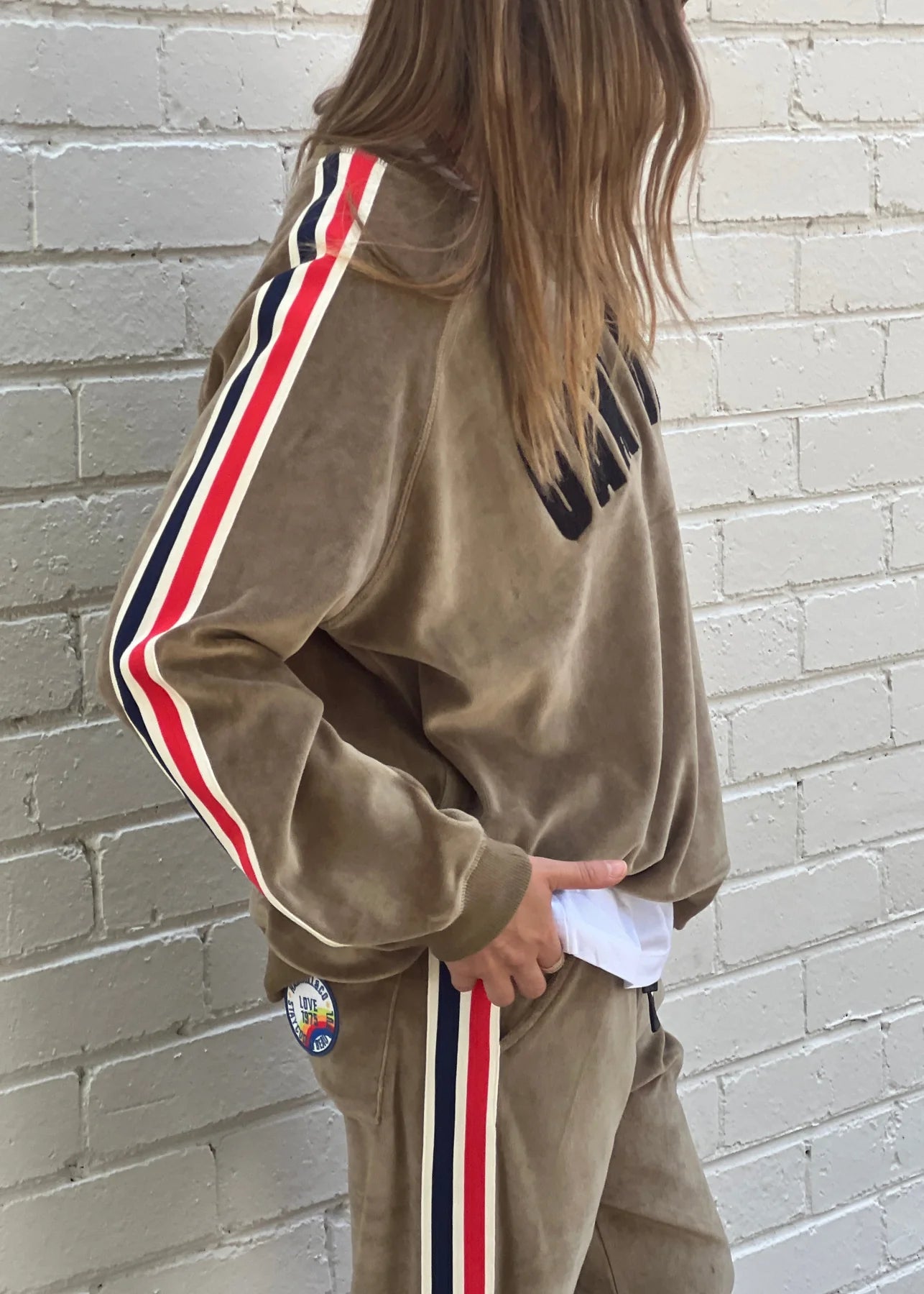 Model wearing game day Khaki sweat by Hammill& Co