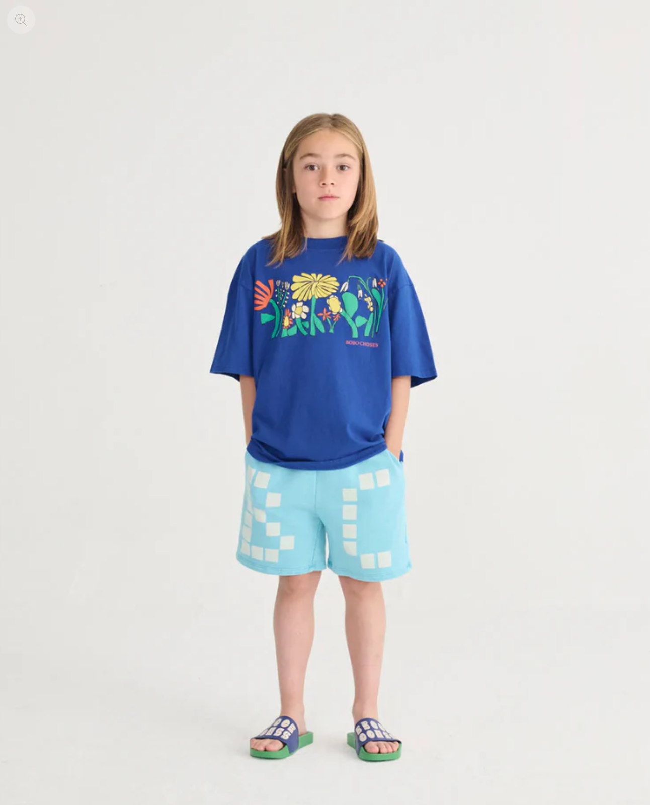 Kid wearing the Square Bobo Choses Bermuda Shorts - Light Blue | Bobo Choses