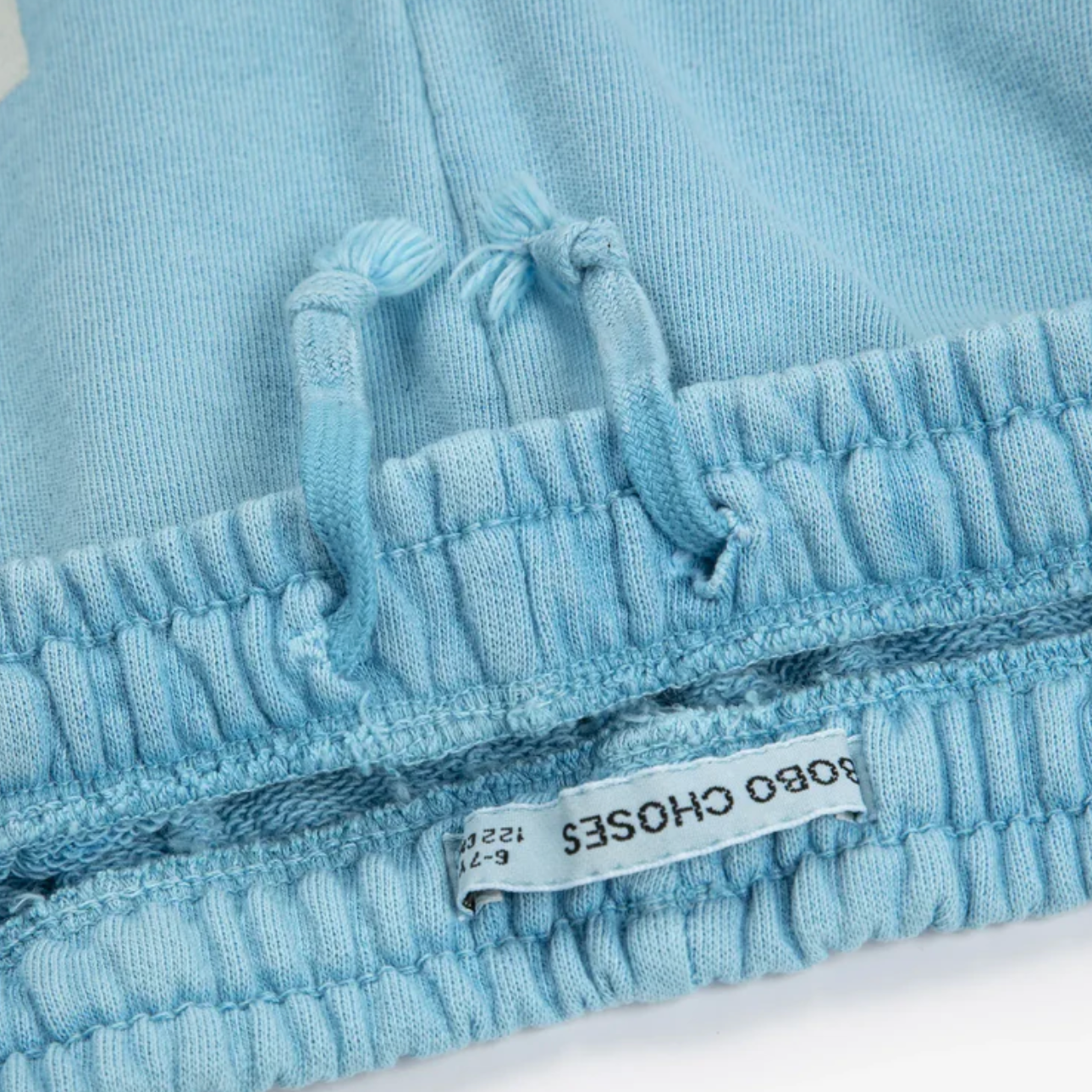 Close up of waistband on the Square Bobo Choses Bermuda Shorts - Light Blue | Bobo Choses