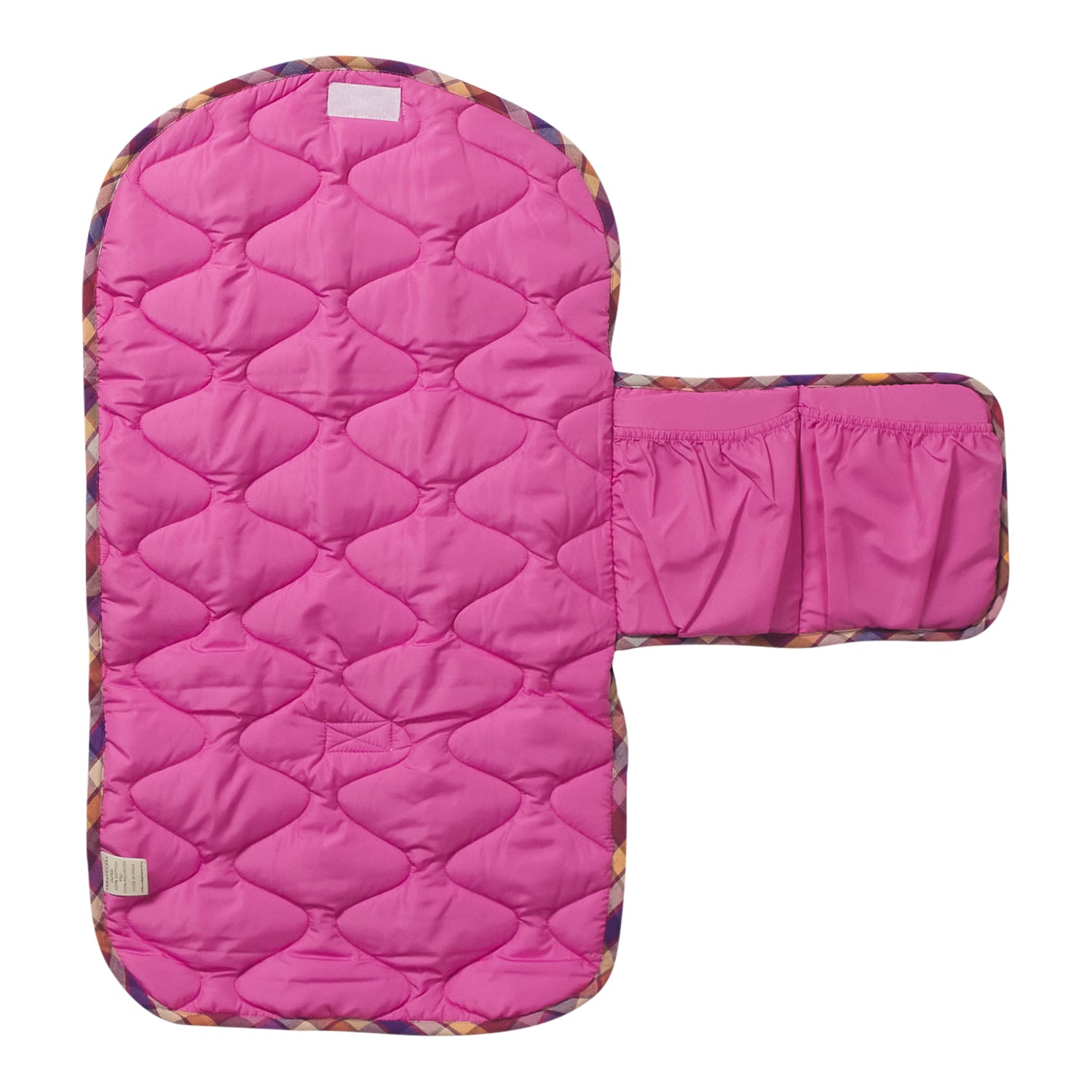 Top view of pink Stela Change Mat displaying quilted diamond pattern and colorful plaid binding trim