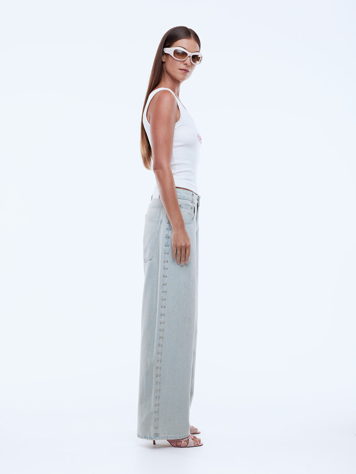 womens light wash jeans with stud detailing down the side