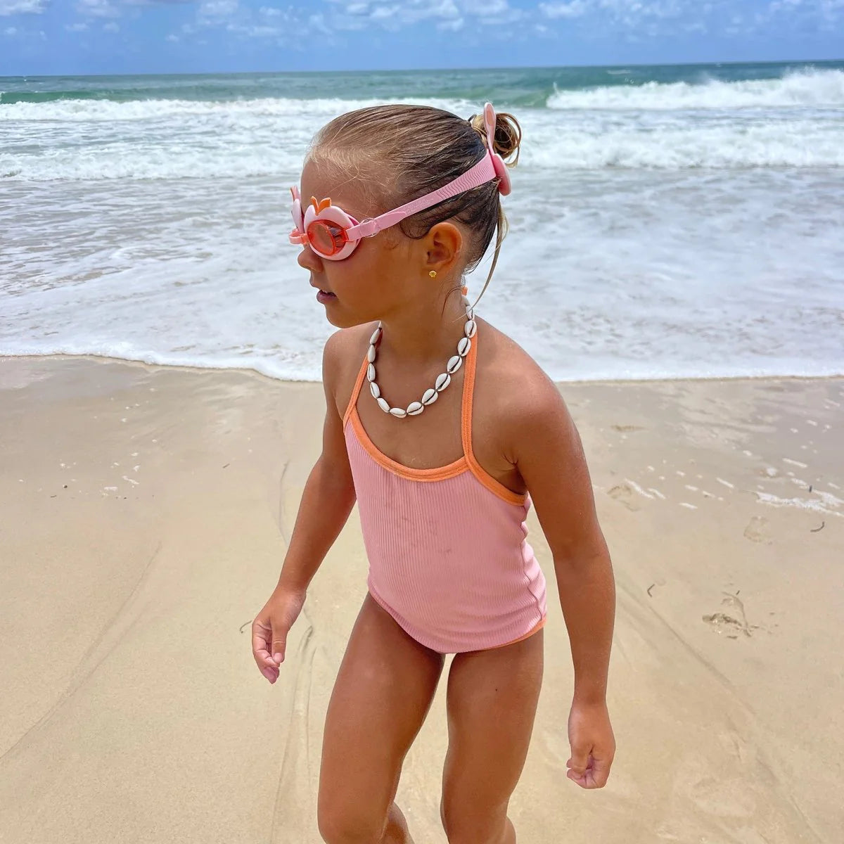 girl wearing Swim goggles cotton candy cherry