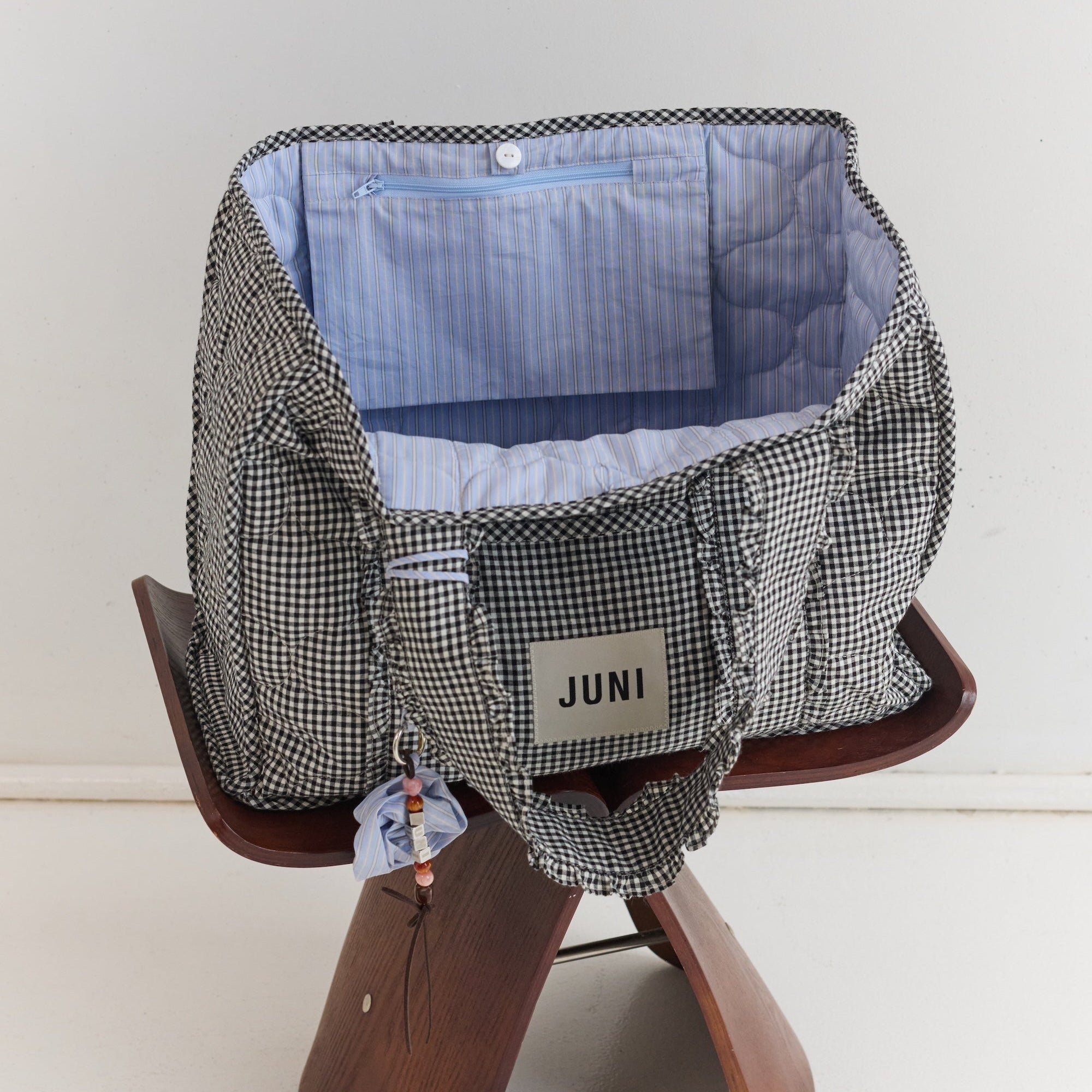 Open view of Vichy Everything Bag showing spacious interior with blue striped lining and multiple pockets