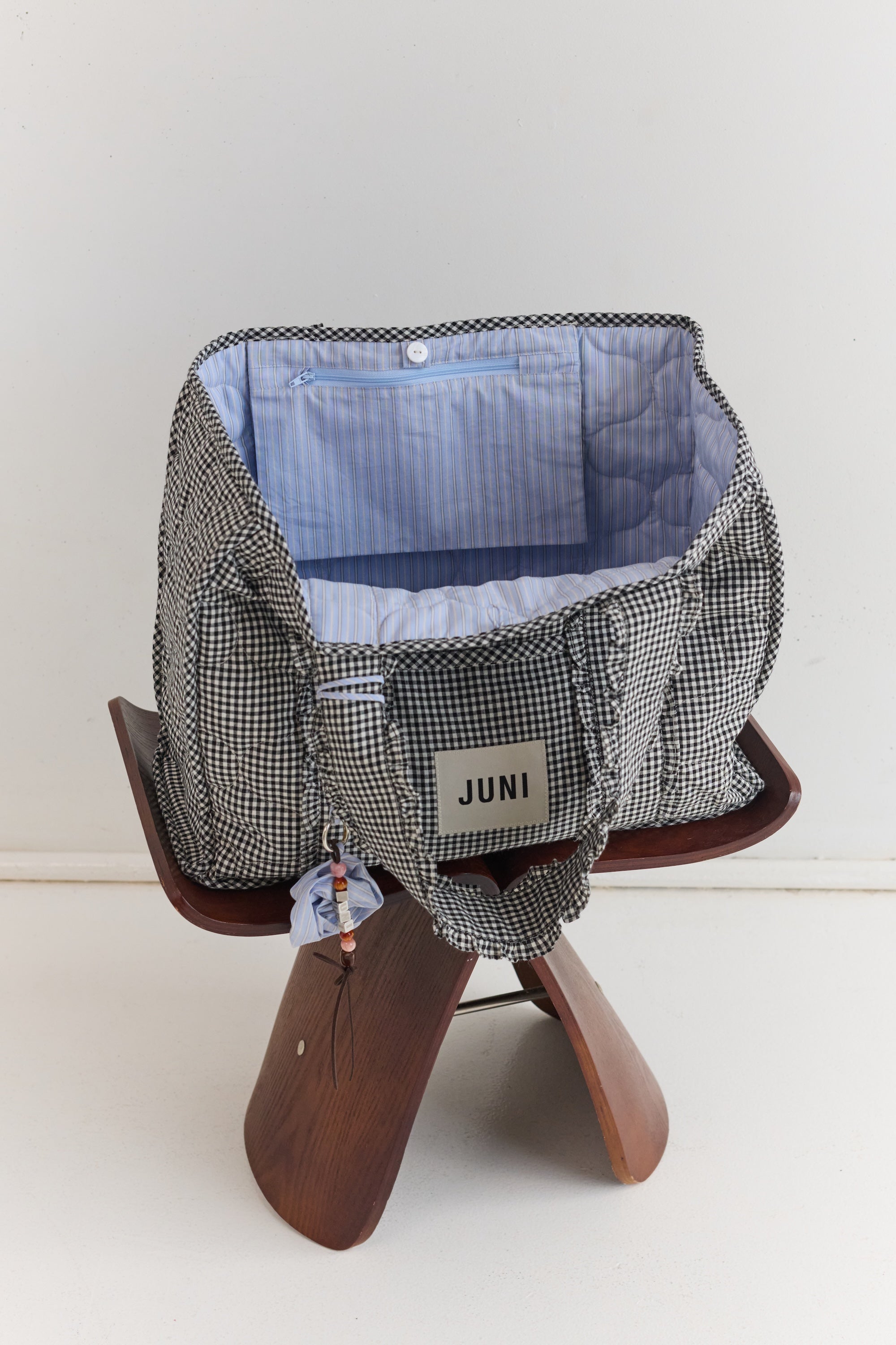 Open view of Vichy Everything Bag showing spacious interior with blue striped lining and multiple pockets