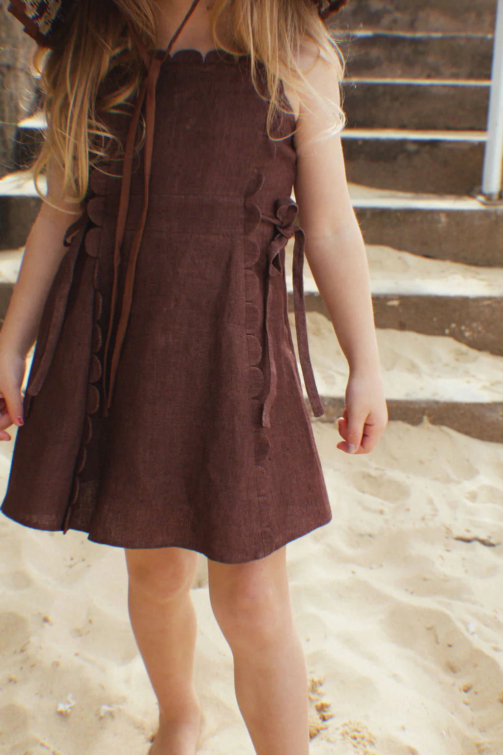 Girls brown linen dress with scalloped edges