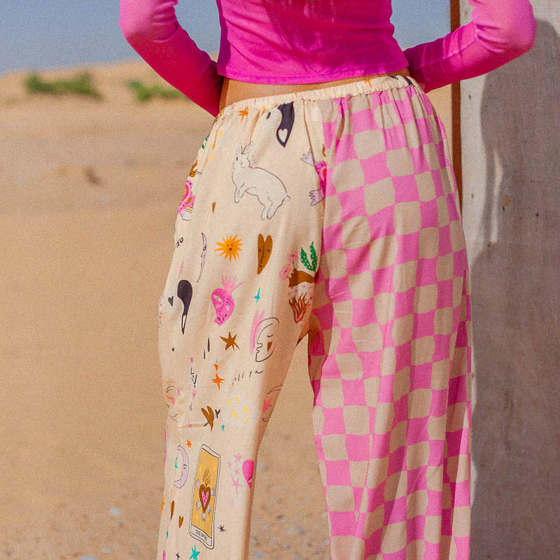 The Lovers Pants by Palm Collective made from 100% Eco Rayon with valentines print on a cream based with spliced pink check