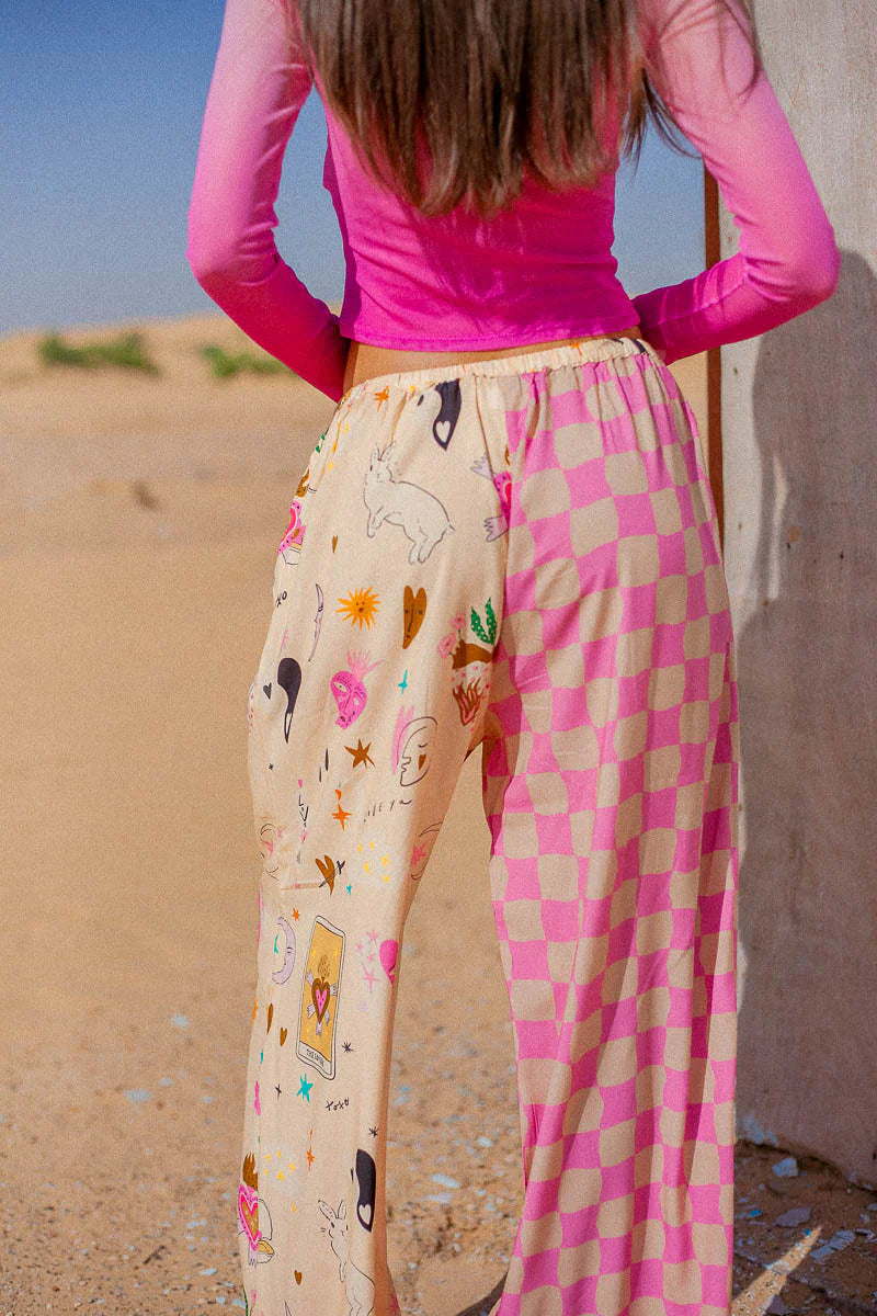 The Lovers Pants by Palm Collective made from 100% Eco Rayon with valentines print on a cream based with spliced pink check